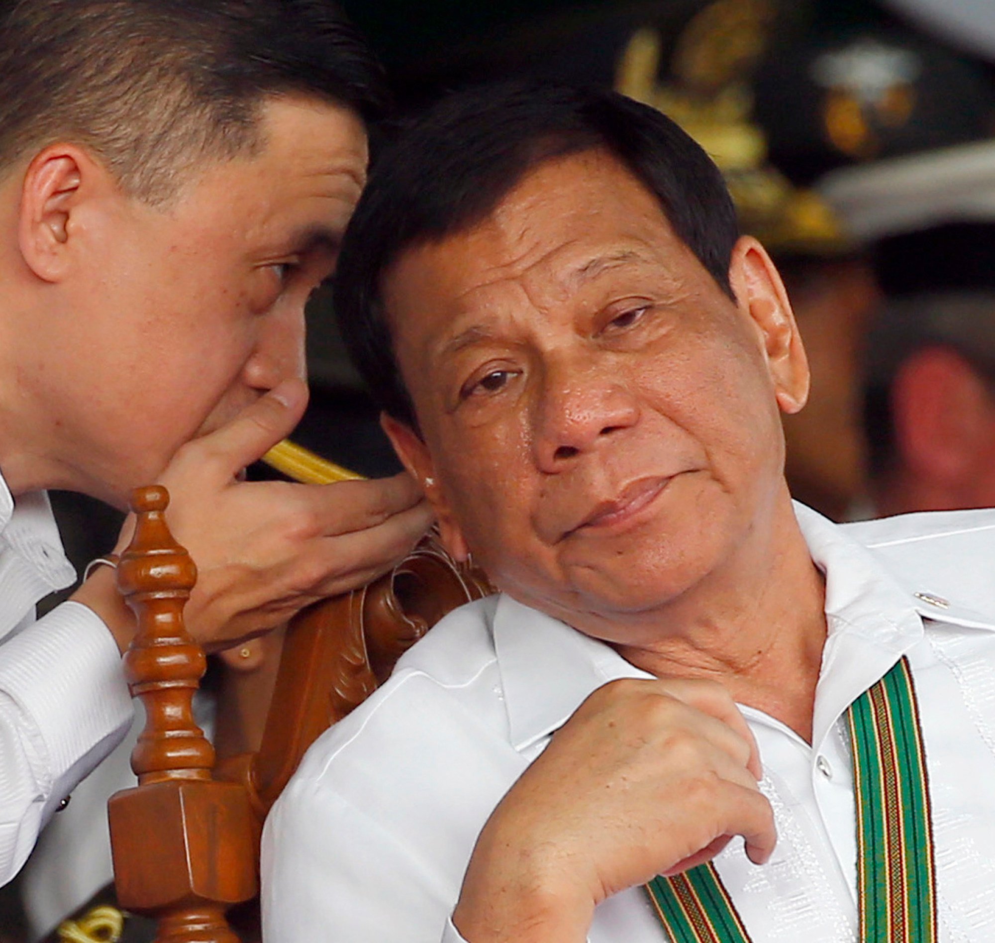 Former Philippine president Rodrigo Duterte (right) listens to his special assistant Bong Go in 2018. Photo: AP Former Philippine president Rodrigo Duterte (right) listens to his special assistant Bong Go in 2018. Photo: AP