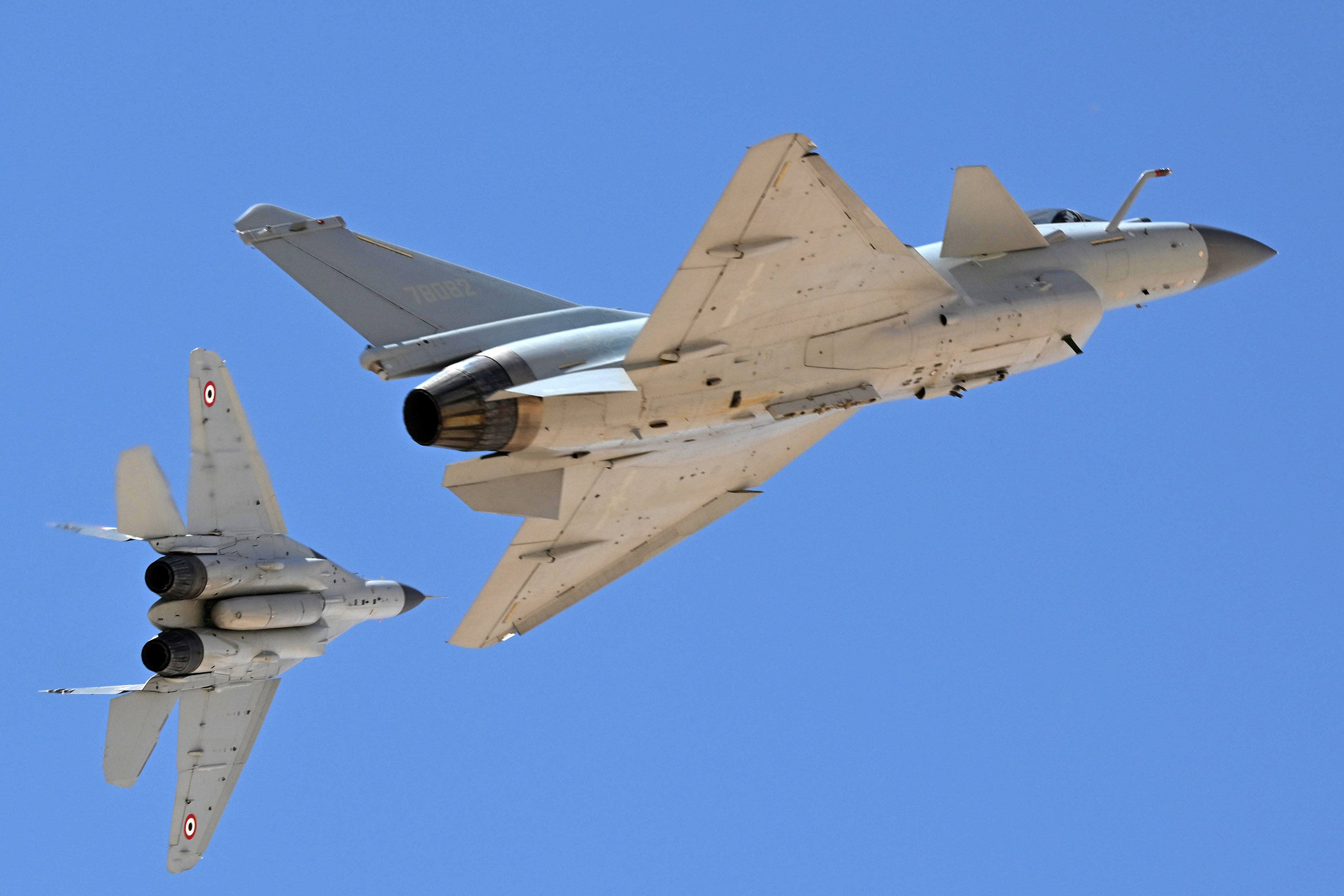 A Chinese J-10C fighter jet (right) flies with an Egyptian Air Force Mig-29 on the first training day of the joint Eagles of Civilisation exercise. Photo: CCTV