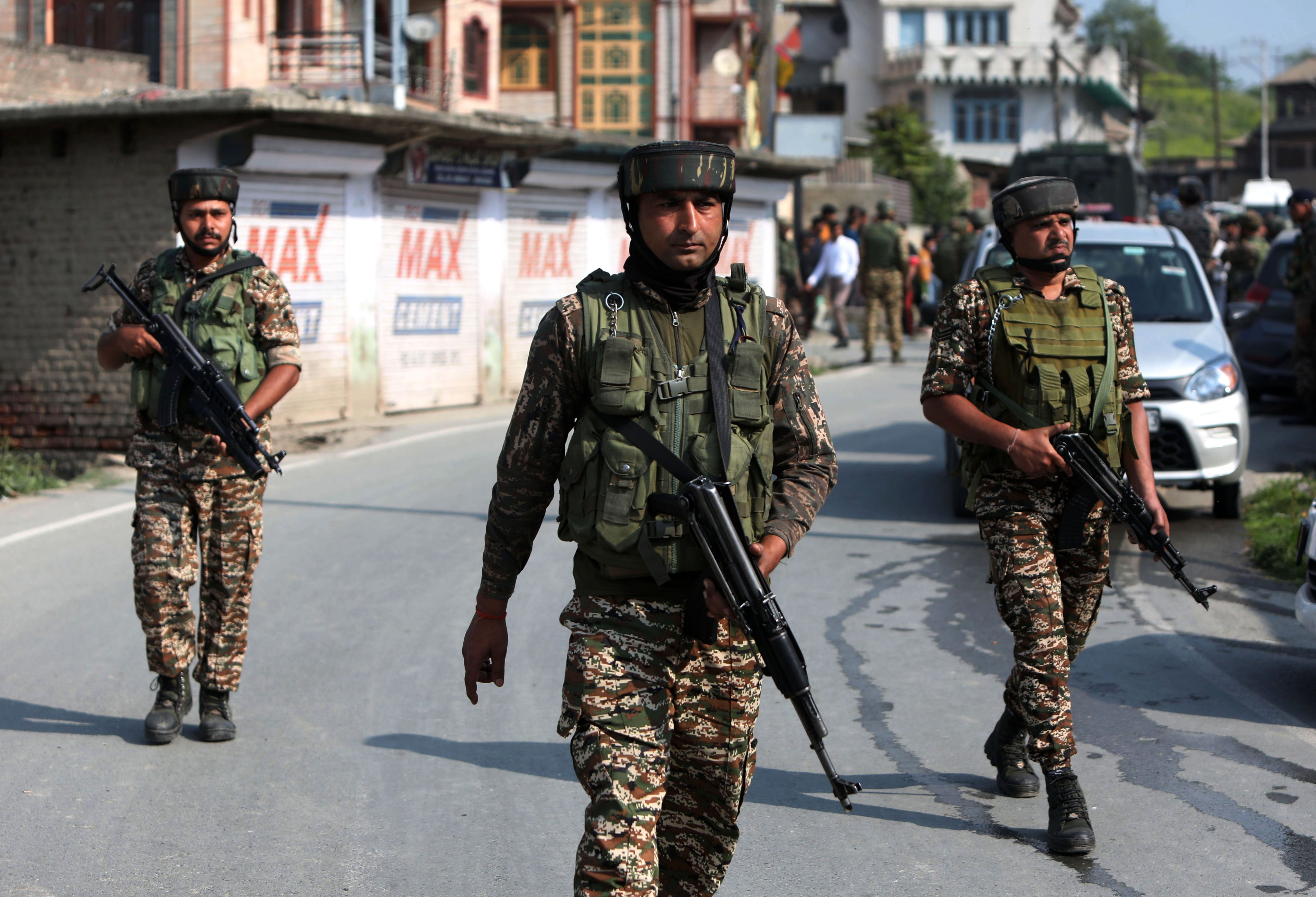 Indian security forces patrol a road in Pampore, on the outskirts of Srinagar, the summer capital of Indian-administered Kashmir, on Wednesday. Photo: EPA-EFE