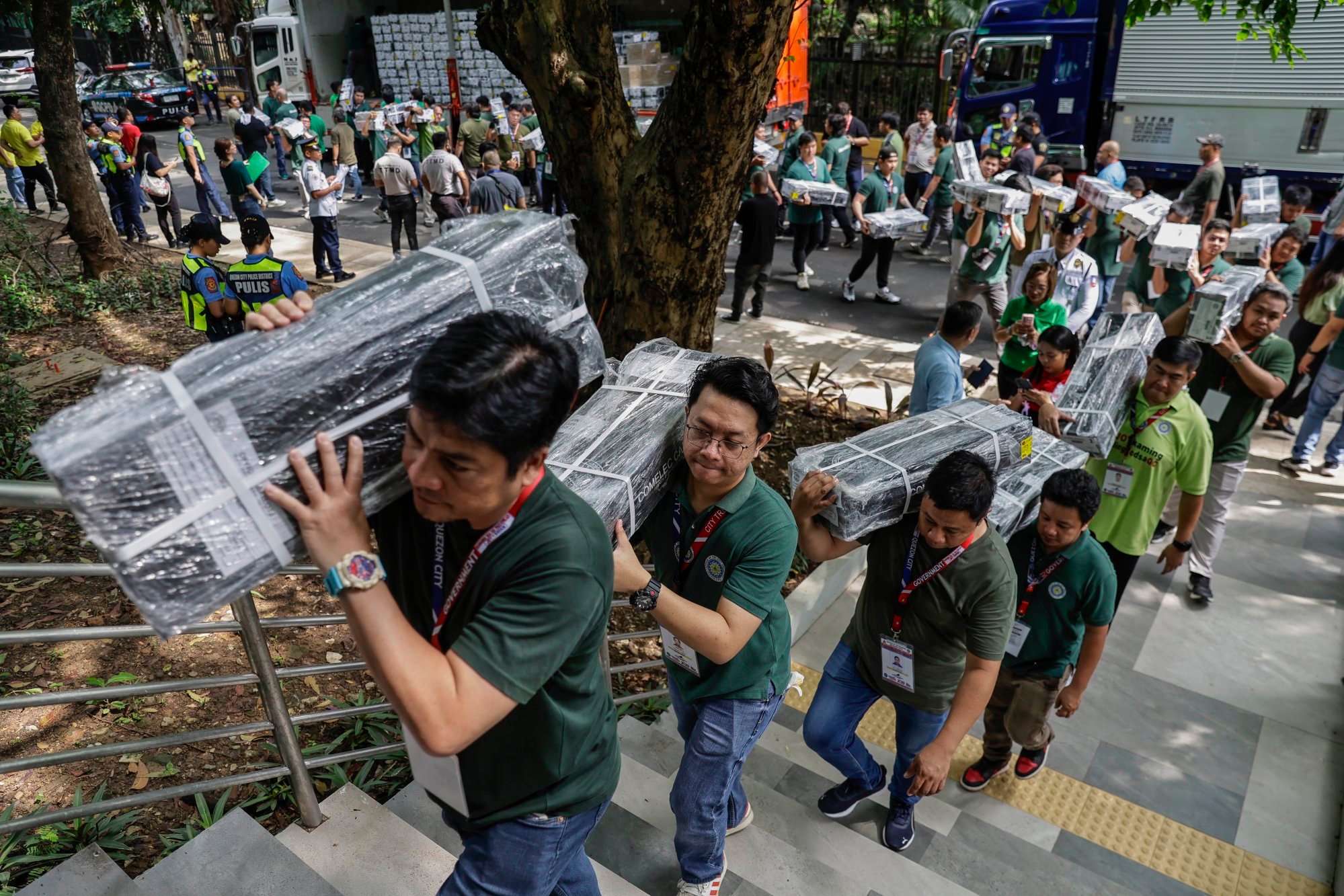 Workers carry official ballots sealed by the Commission on Elections for storage at city hall in Quezon City, Metro Manila, the Philippines, on Tuesday, ahead of the midterm elections on May 12. Photo: EPA-EFE Workers carry official ballots sealed by the Commission on Elections for storage at city hall in Quezon City, Metro Manila, the Philippines, on Tuesday, ahead of the midterm elections on May 12. Photo: EPA-EFE