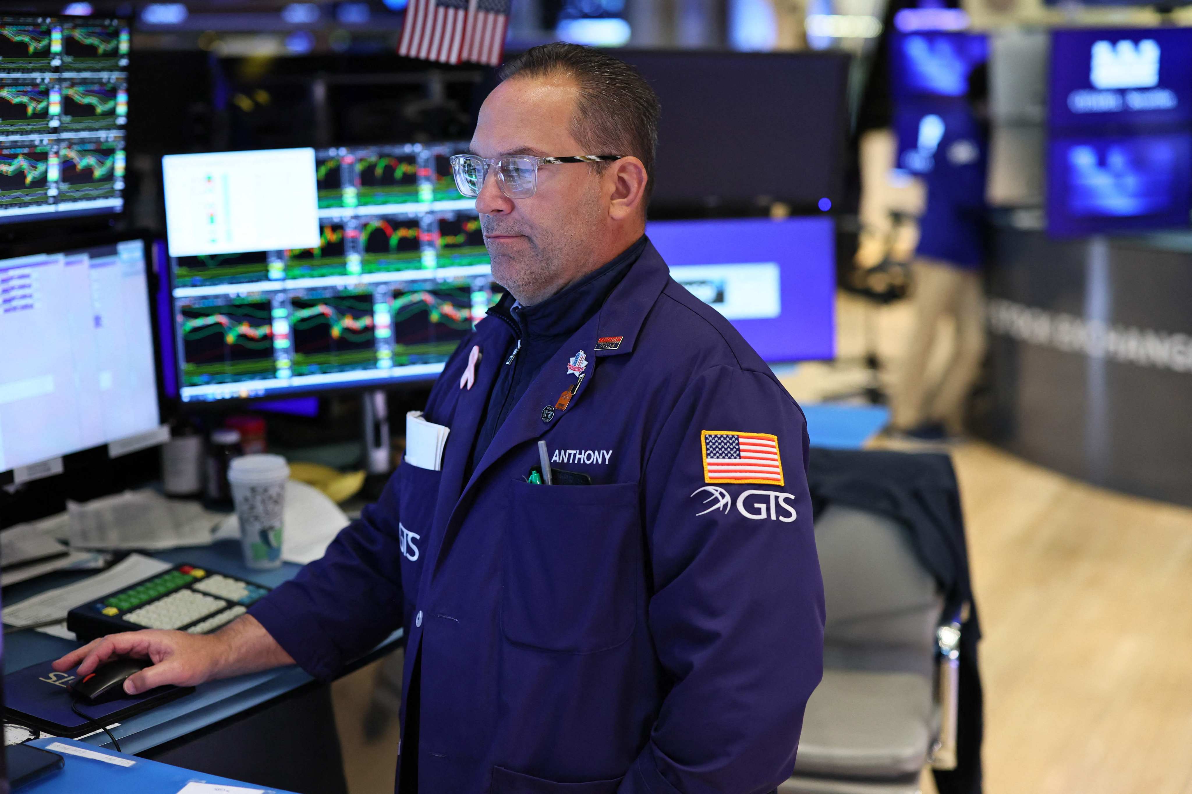 A traders works on the floor of the New York Stock Exchange on Wednesday. The S&P 500 index, Dow Jones Industrial Average and Nasdaq composite all opened higher. Photo: via AFP