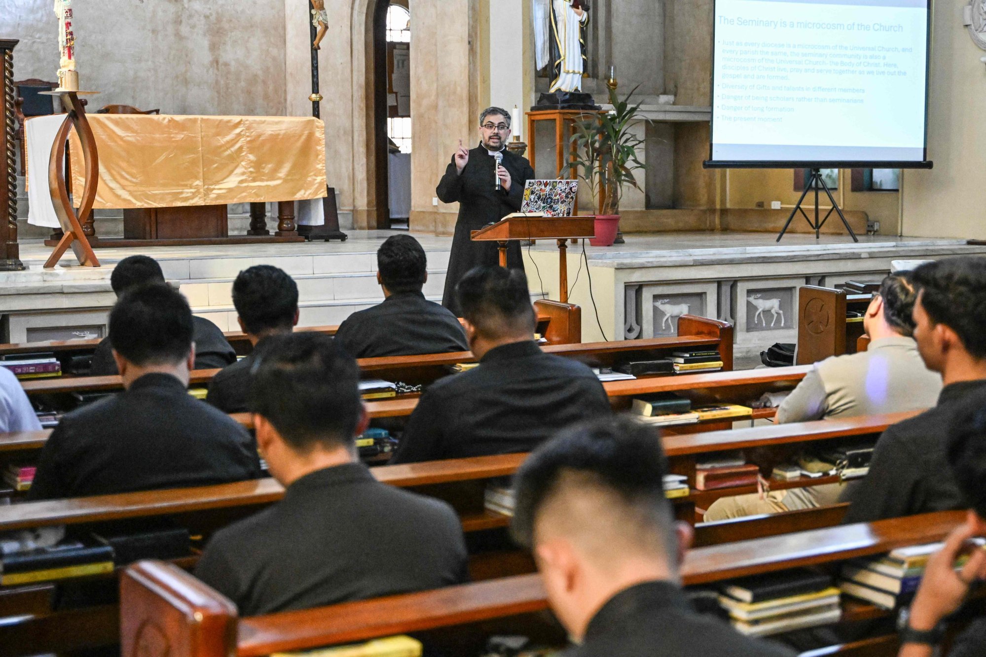 Seminarians attend a conference inside the chapel of the University of Santo Tomas’ Central Seminary in Manila on May 5. Photo: AFP Seminarians attend a conference inside the chapel of the University of Santo Tomas’ Central Seminary in Manila on May 5. Photo: AFP