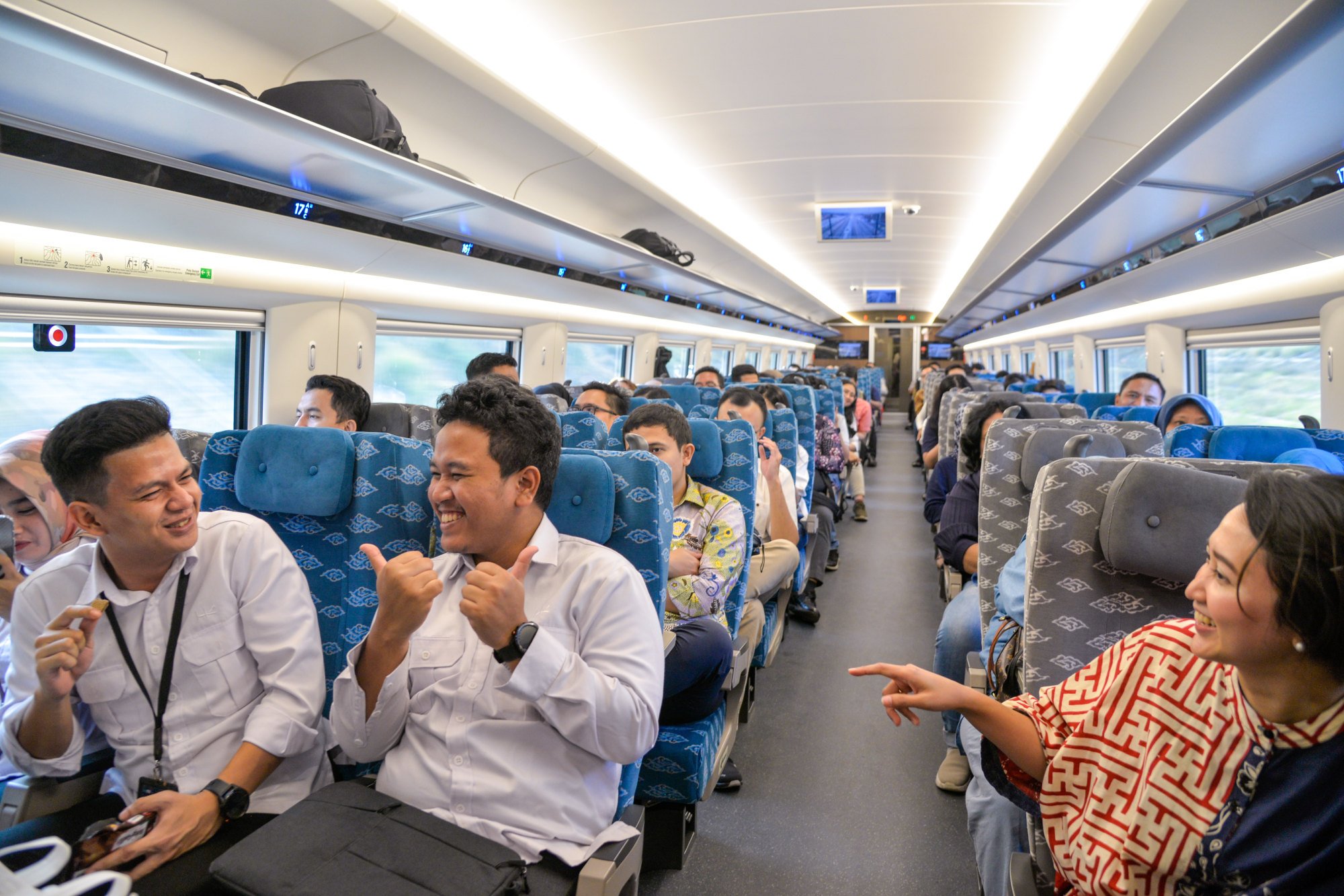 Passengers chat on a train running on the Jakarta-Bandung high-speed line in Indonesia, in October 2023. Photo: Xinhua Passengers chat on a train running on the Jakarta-Bandung high-speed line in Indonesia, in October 2023. Photo: Xinhua