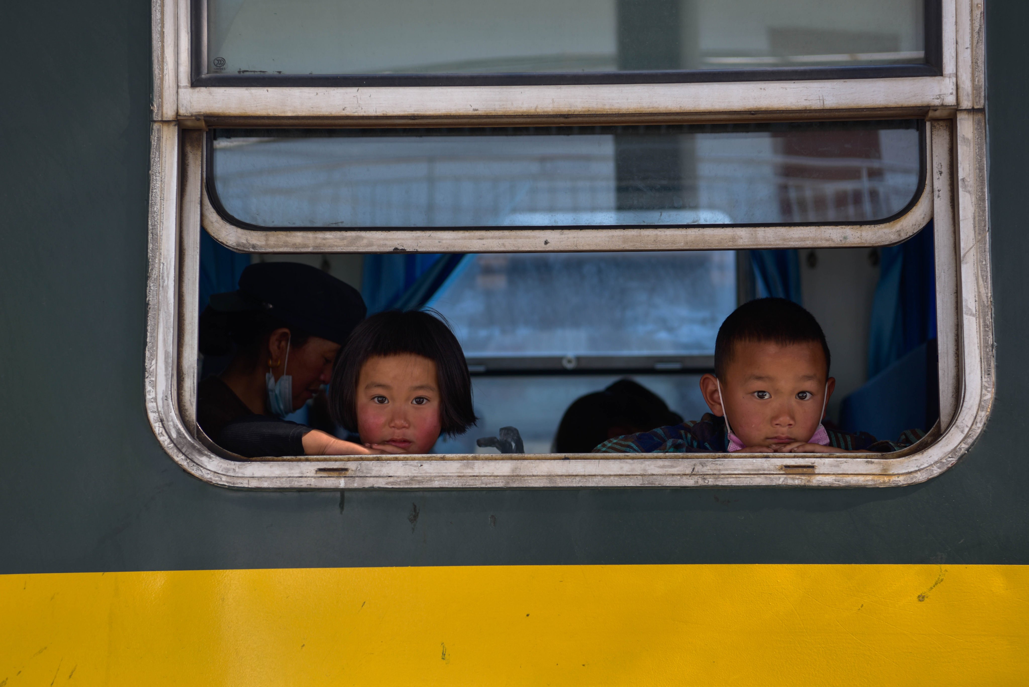 Young train passengers travel through Sichuan province in 2021. Photo: Xinhua