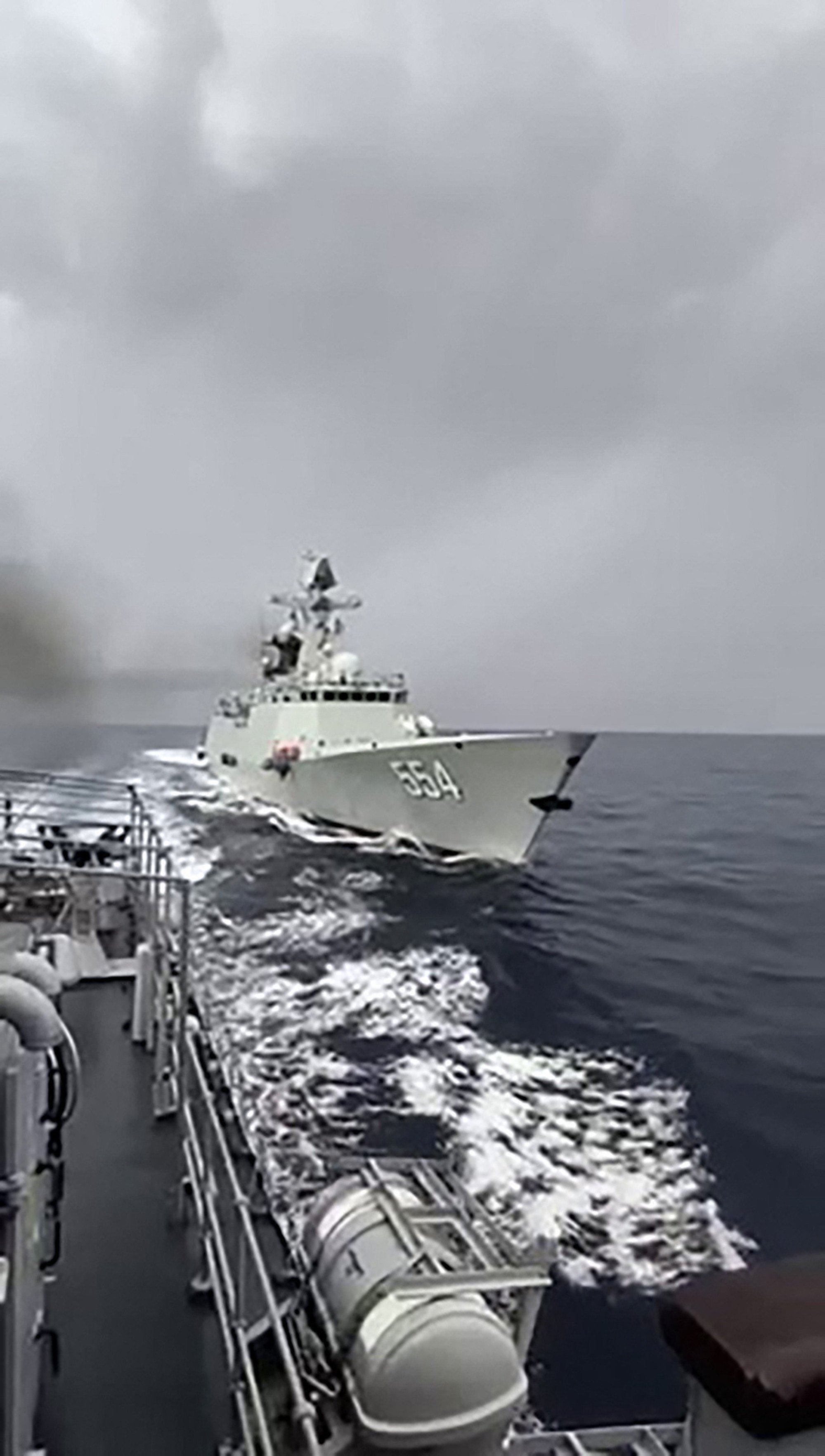 A Chinese frigate (right) tails a Philippine navy vessel during a maritime patrol near Scarborough Shoal in the disputed South China Sea on May 5. Photo: Armed Forces of the Philippines Public Affairs Office / AFP A Chinese frigate (right) tails a Philippine navy vessel during a maritime patrol near Scarborough Shoal in the disputed South China Sea on May 5. Photo: Armed Forces of the Philippines Public Affairs Office / AFP