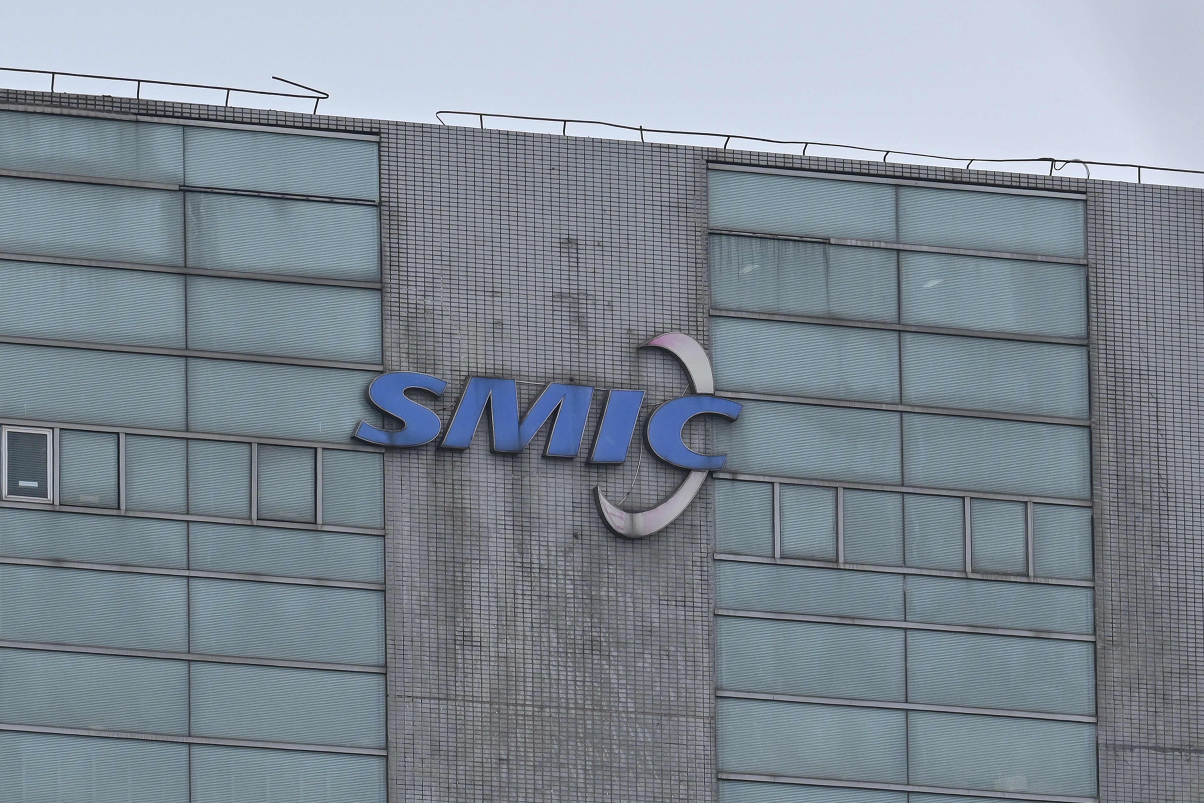 The logo of Semiconductor Manufacturing International Corporation at the chipmaker’s facilities in Shanghai on March 15, 2024. Photo: AFP