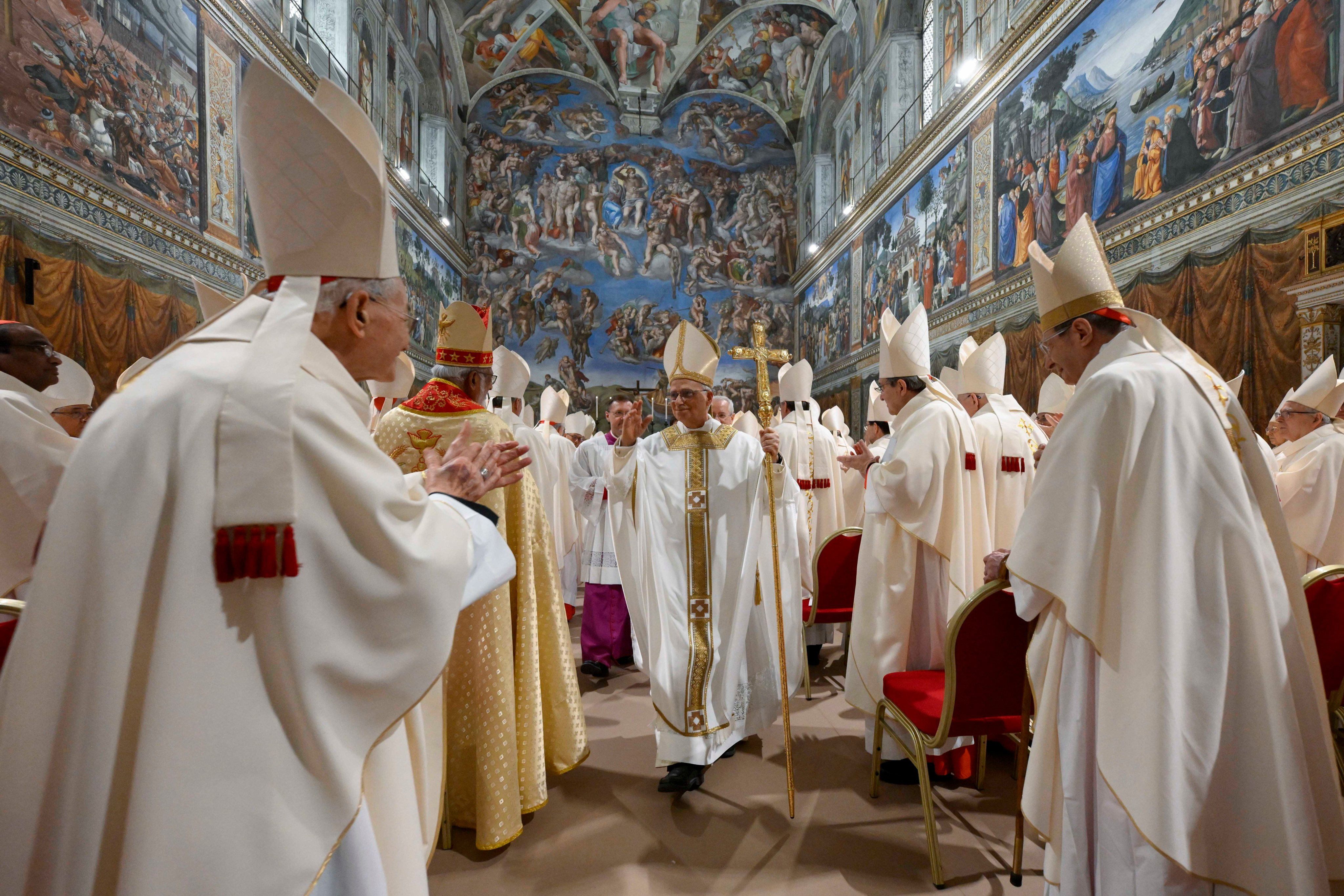 Pope Leo XIV, centre, after holding mass with the cardinals in the Sistine Chapel. Photo: Vatican Media via AP