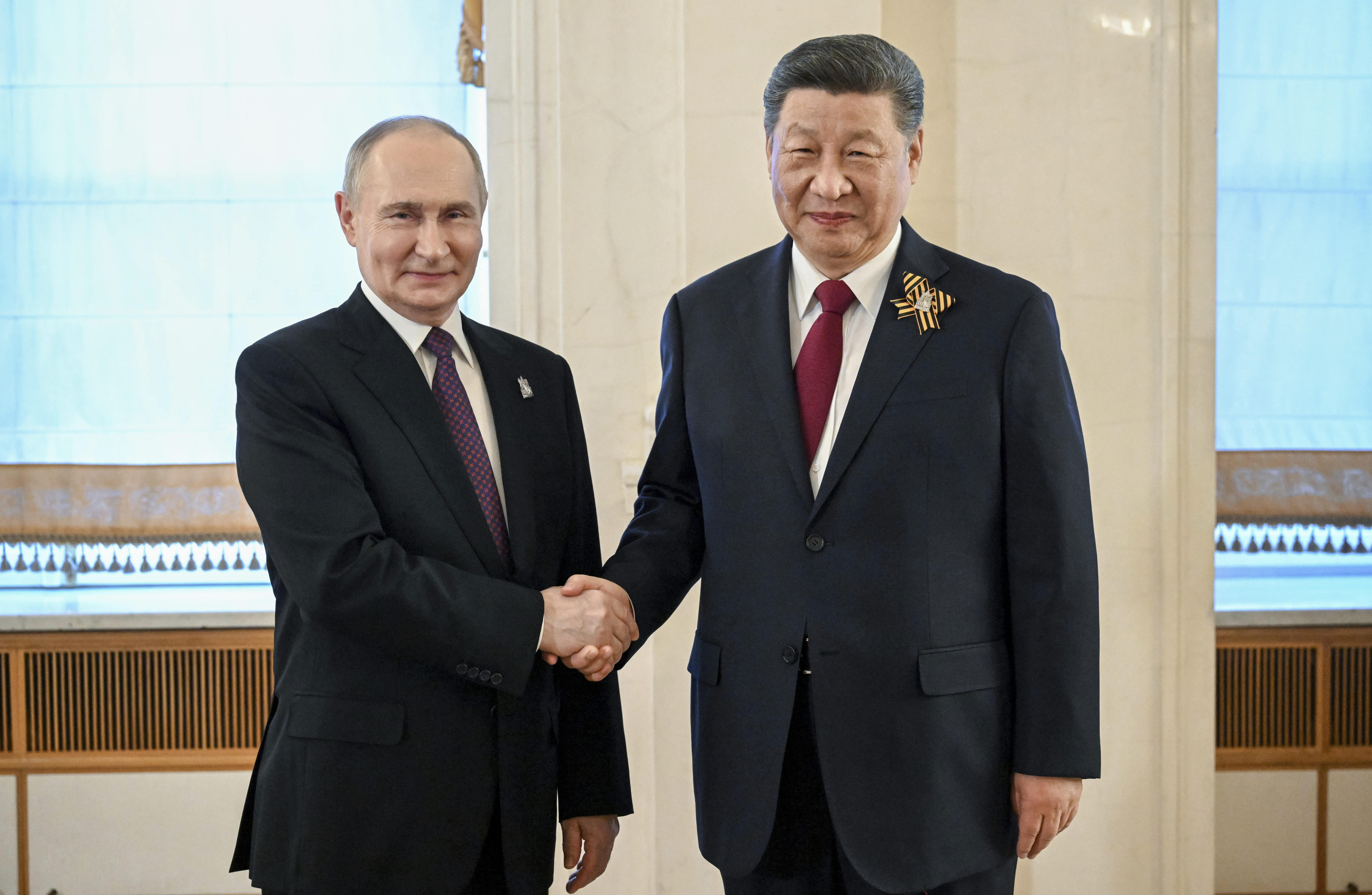 Russian Vladimir Putin and  Chinese President Xi Jinping at the Kremlin on Thursday, celebrating the 80th anniversary of the defeat of Germany in World War II. Photo: RIA Novosti via AP