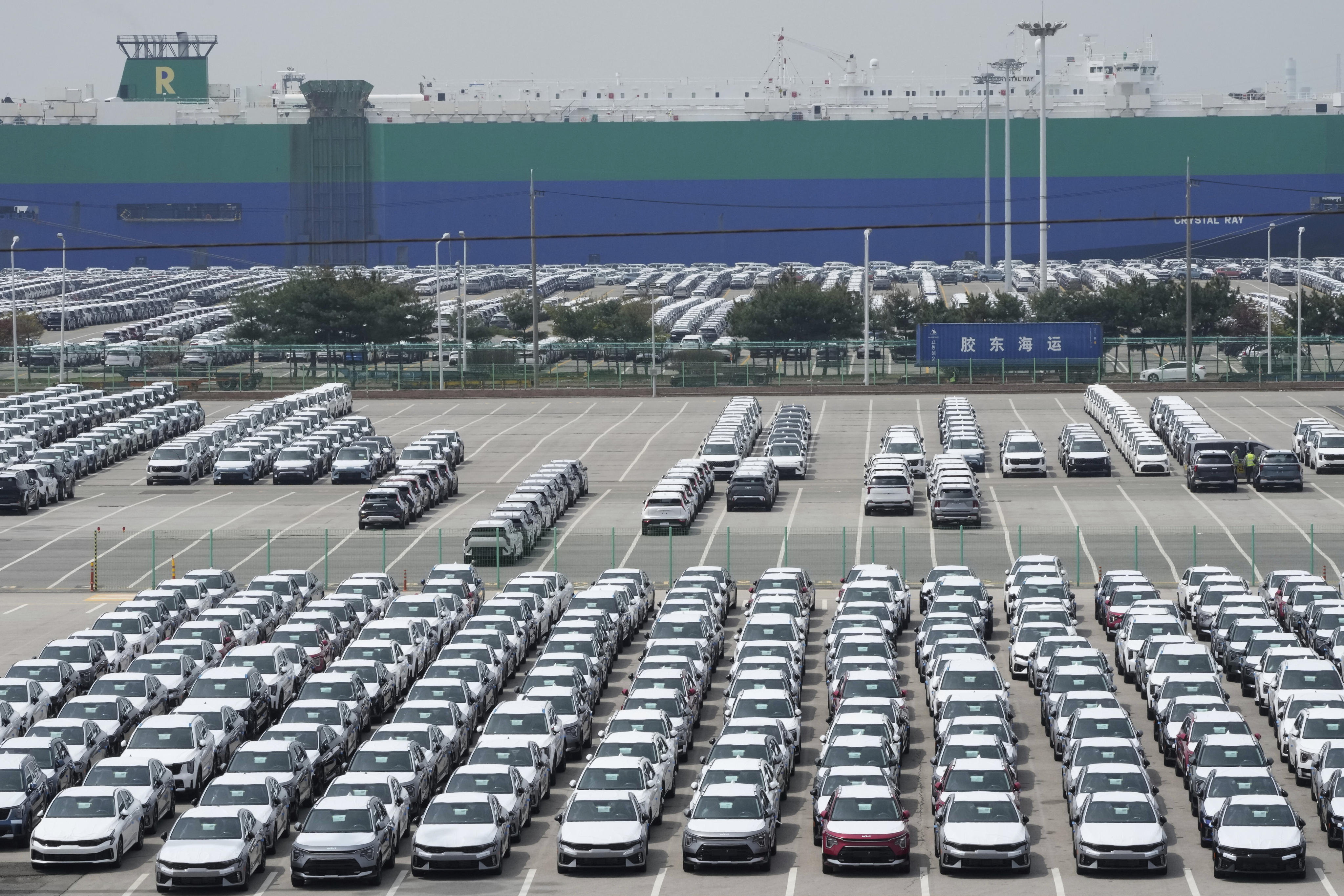 Vehicles for export are parked at a port in Pyeongtaek, South Korea. Photo: AP