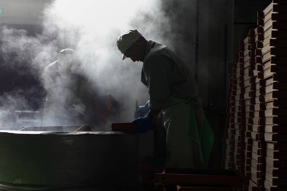 Kenbishi Sake Brewery workers at its brewery in Kobe, Japan. Photo: Instagram/kenbishi.official