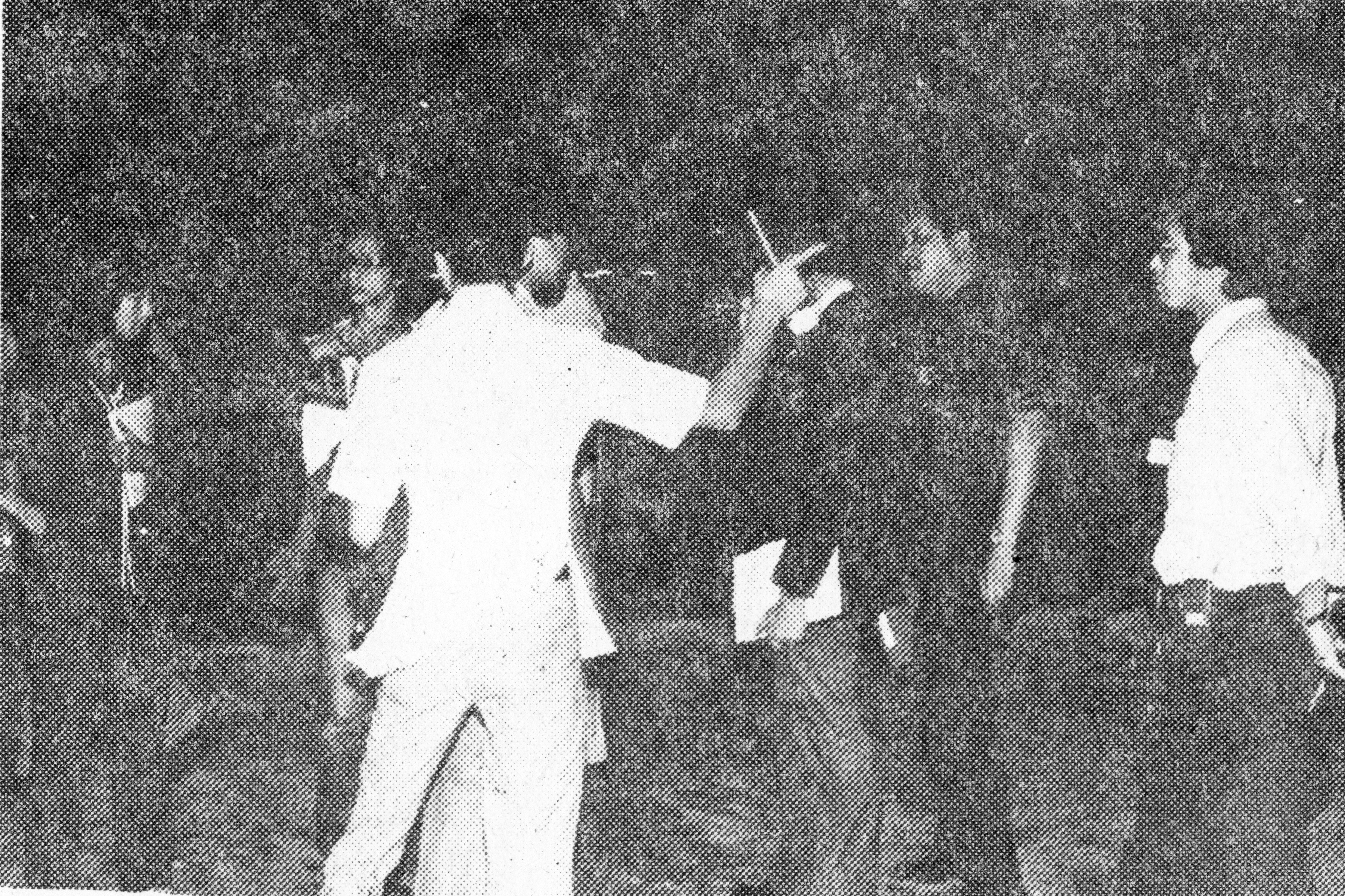 Police investigate at a crime scene at Wah Fu Estate, Aberdeen, in May 1980 where a young man was stabbed to death and his friend seriously injured. Photo: SCMP Archives