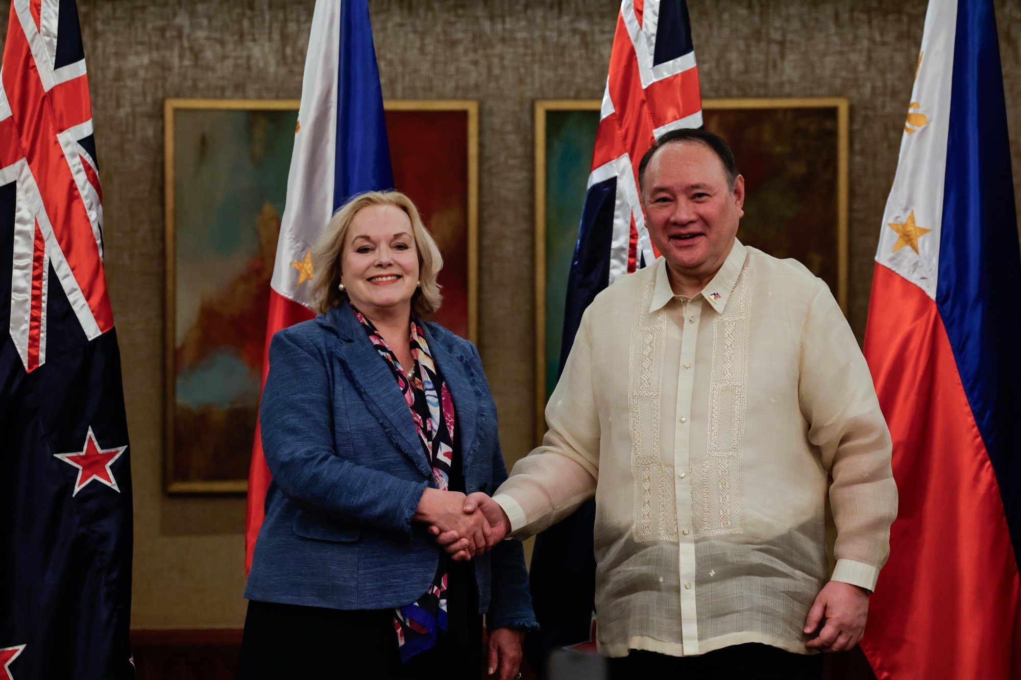 New Zealand’s Defence Minister Judith Collins (left) and Philippine Defence Secretary Gilberto Teodoro Jnr shake hands after a bilateral meeting in Metro Manila on April 30. Photo: EPA-EFE