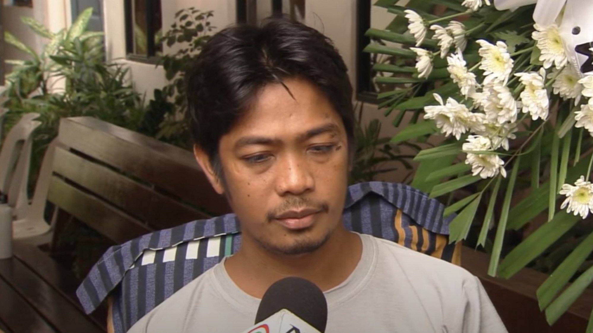 Jerry Tuazon lost his wife and child after a passenger bus slammed into a queue of vehicles at a highway toll plaza on May 1. Photo: ABS-CBN News Jerry Tuazon lost his wife and child after a passenger bus slammed into a queue of vehicles at a highway toll plaza on May 1. Photo: ABS-CBN News