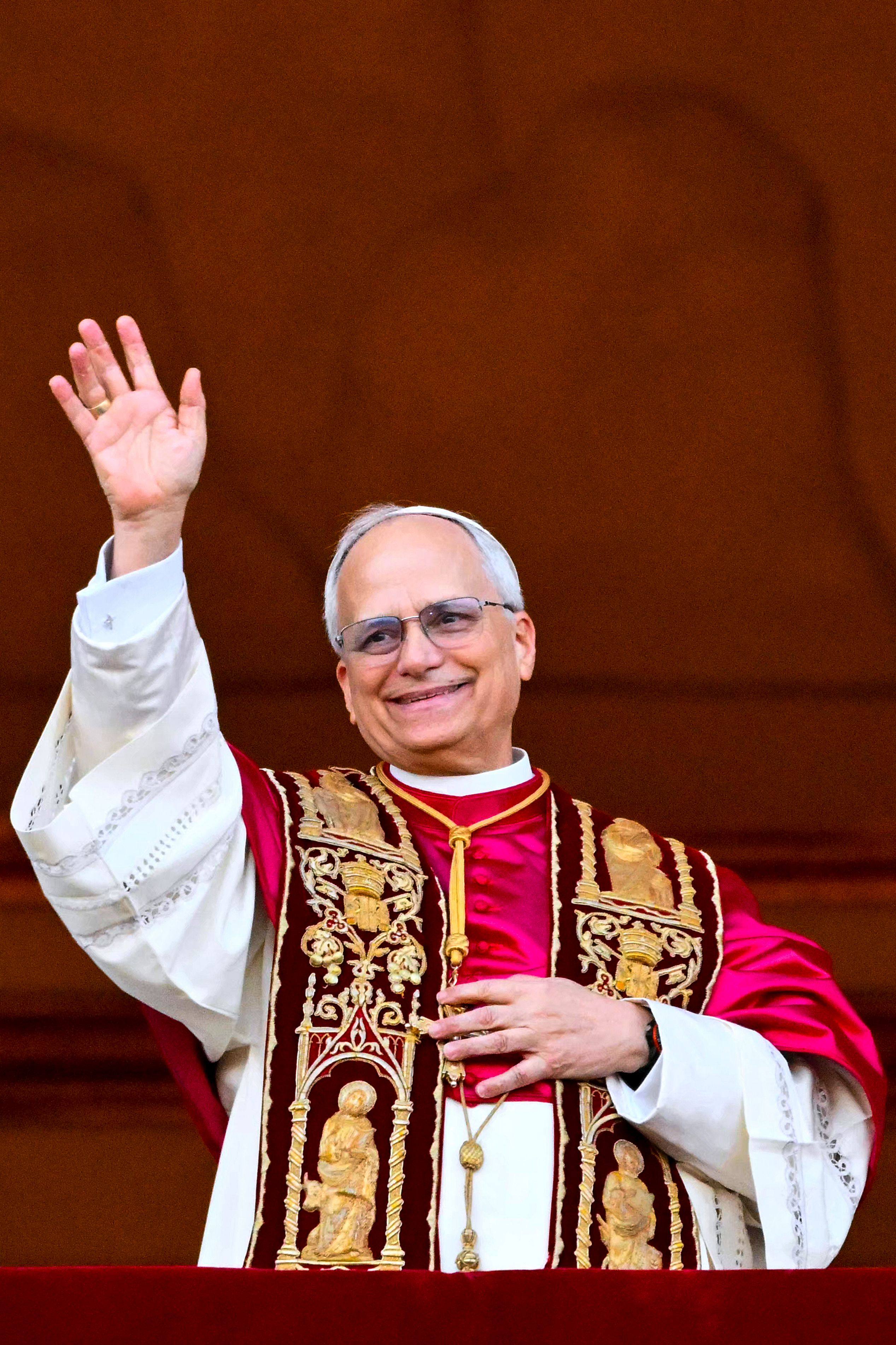 Newly elected Pope Leo XIV, Robert Prevost appears at the main central loggia balcony of the St Peter’s Basilica for the first time, after the cardinals ended the conclave, in The Vatican, on Thursday. Photo: AFP