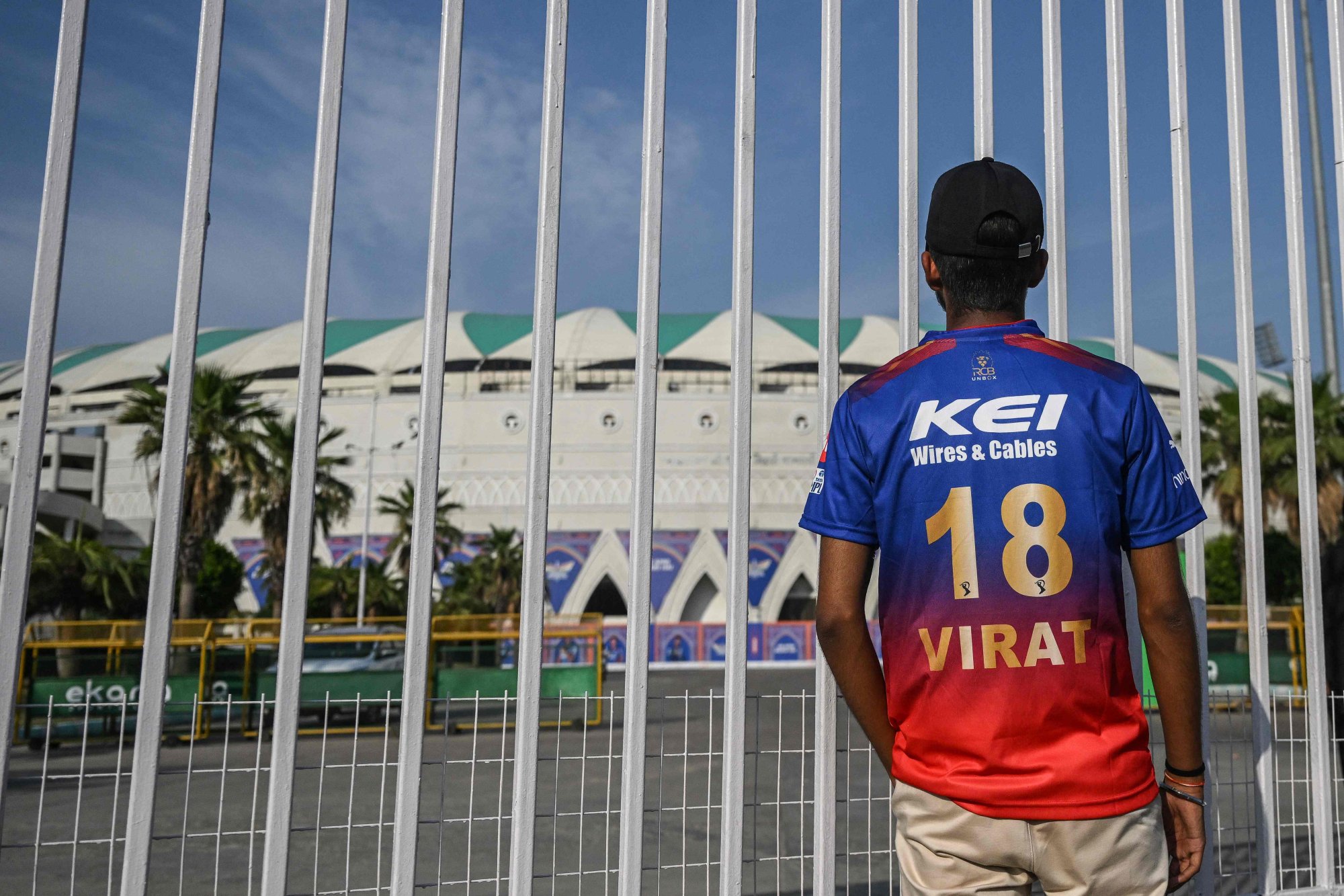 A cricket fan stands outside the Ekana Cricket Stadium in Lucknow on Friday, after the Indian Premier League Twenty20 cricket tournament was suspended for a week following the cross-border tensions between India and Pakistan. Photo: AFP A cricket fan stands outside the Ekana Cricket Stadium in Lucknow on Friday, after the Indian Premier League Twenty20 cricket tournament was suspended for a week following the cross-border tensions between India and Pakistan. Photo: AFP