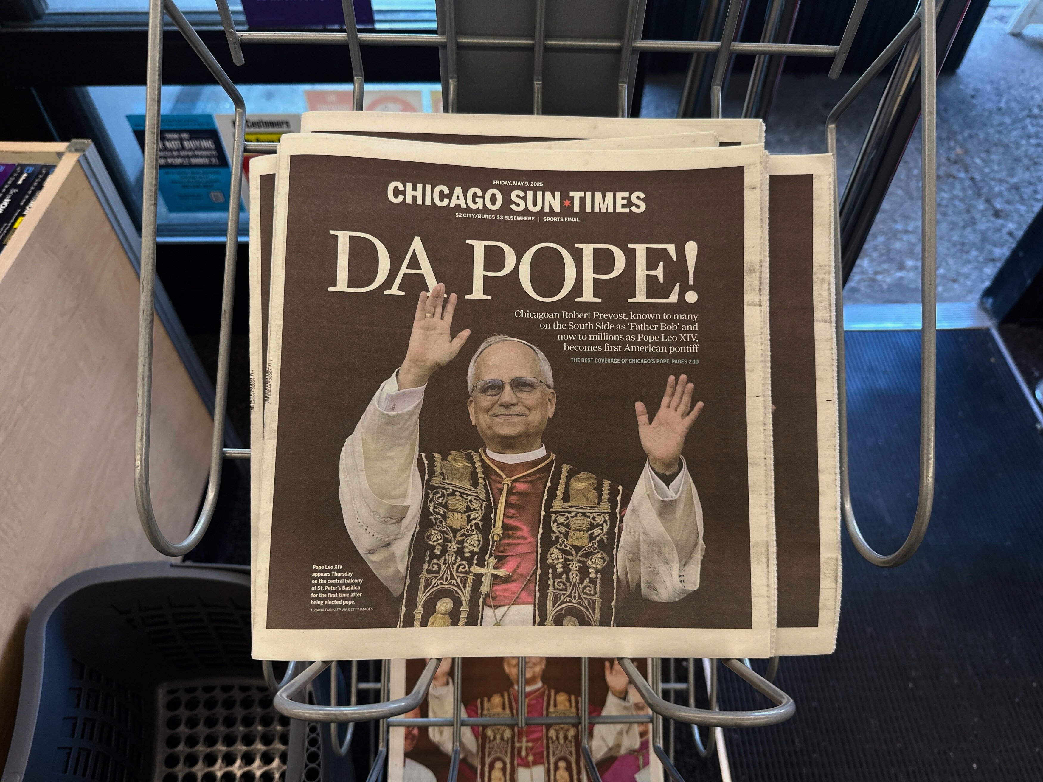The Chicago Sun Times front page showing Pope Leo XIV is seen on a newspaper rack on Friday. Photo: AP