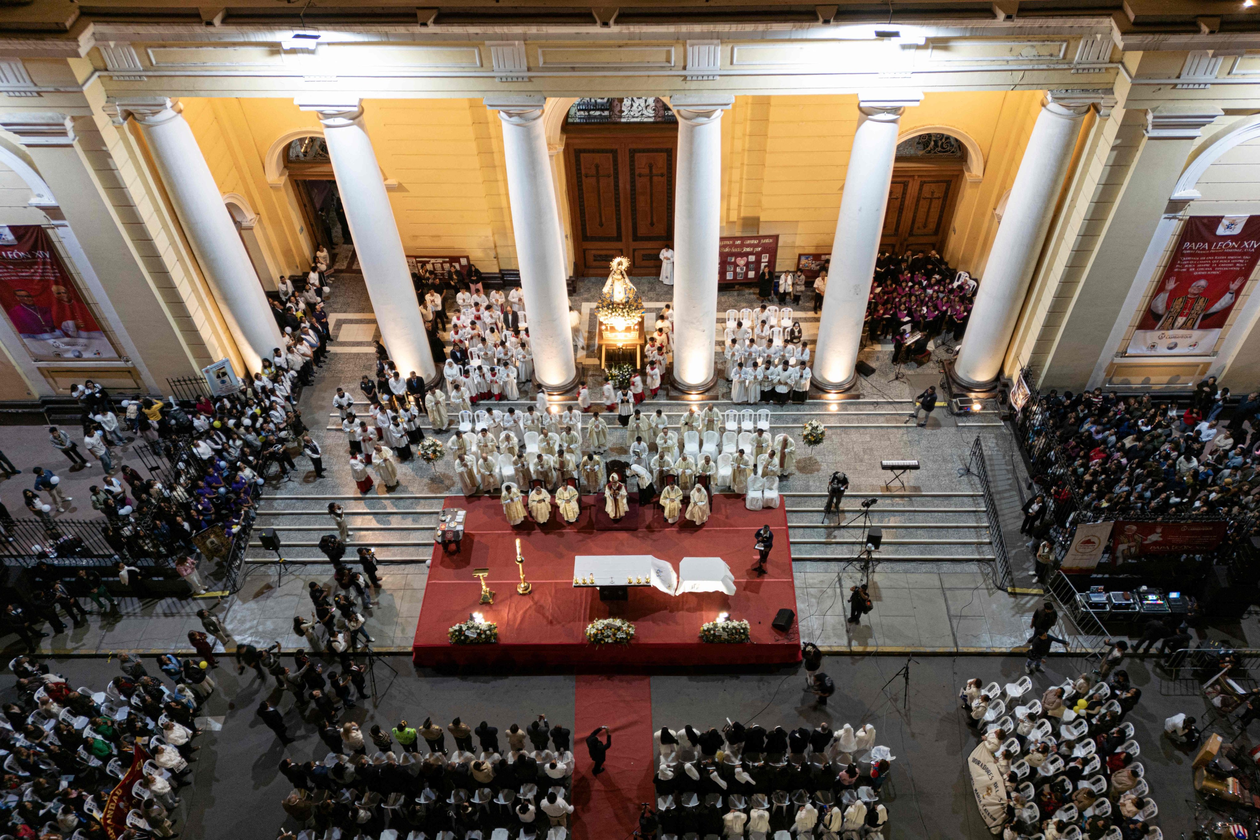 Bishop of Chiclayo Edinson Edgardo Farfán (centre) leads a mass in honour of newly elected Pope Leo XIV at the Cathedral of Saint Mary in Chiclayo, Peru on Saturday. Photo: AFP