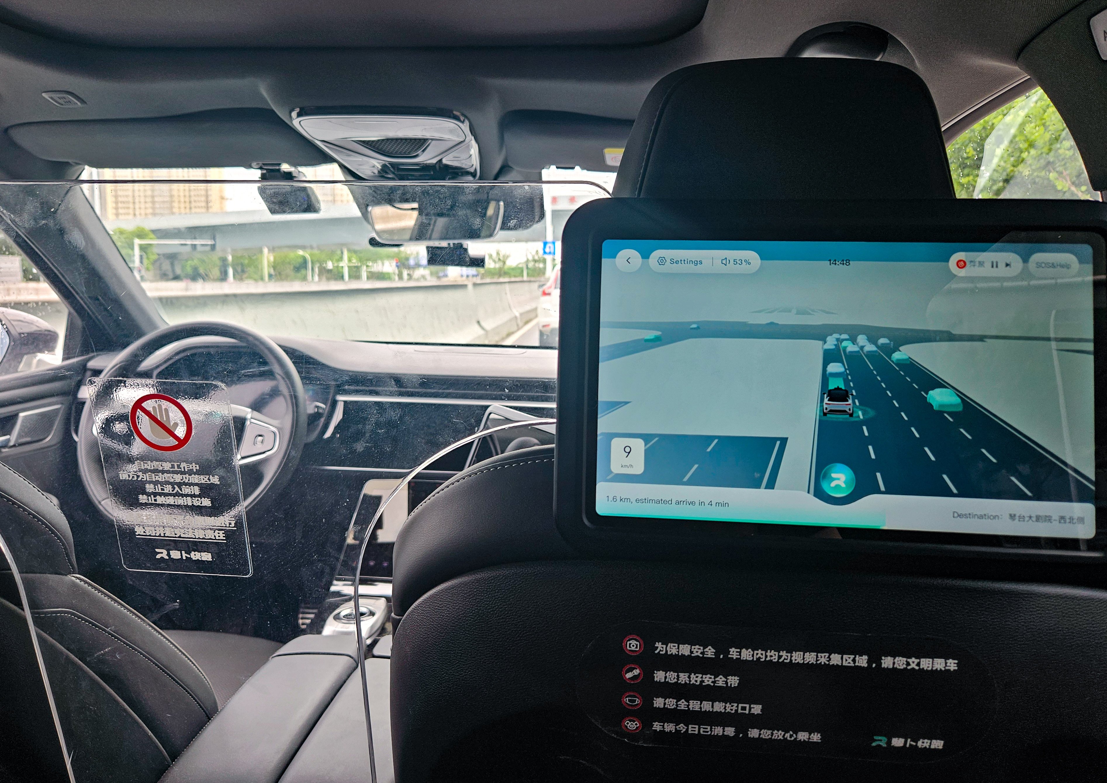 An Apollo Go robotaxi navigates the road in Wuhan, Hubei province, in July last year. Photo: Coco Feng