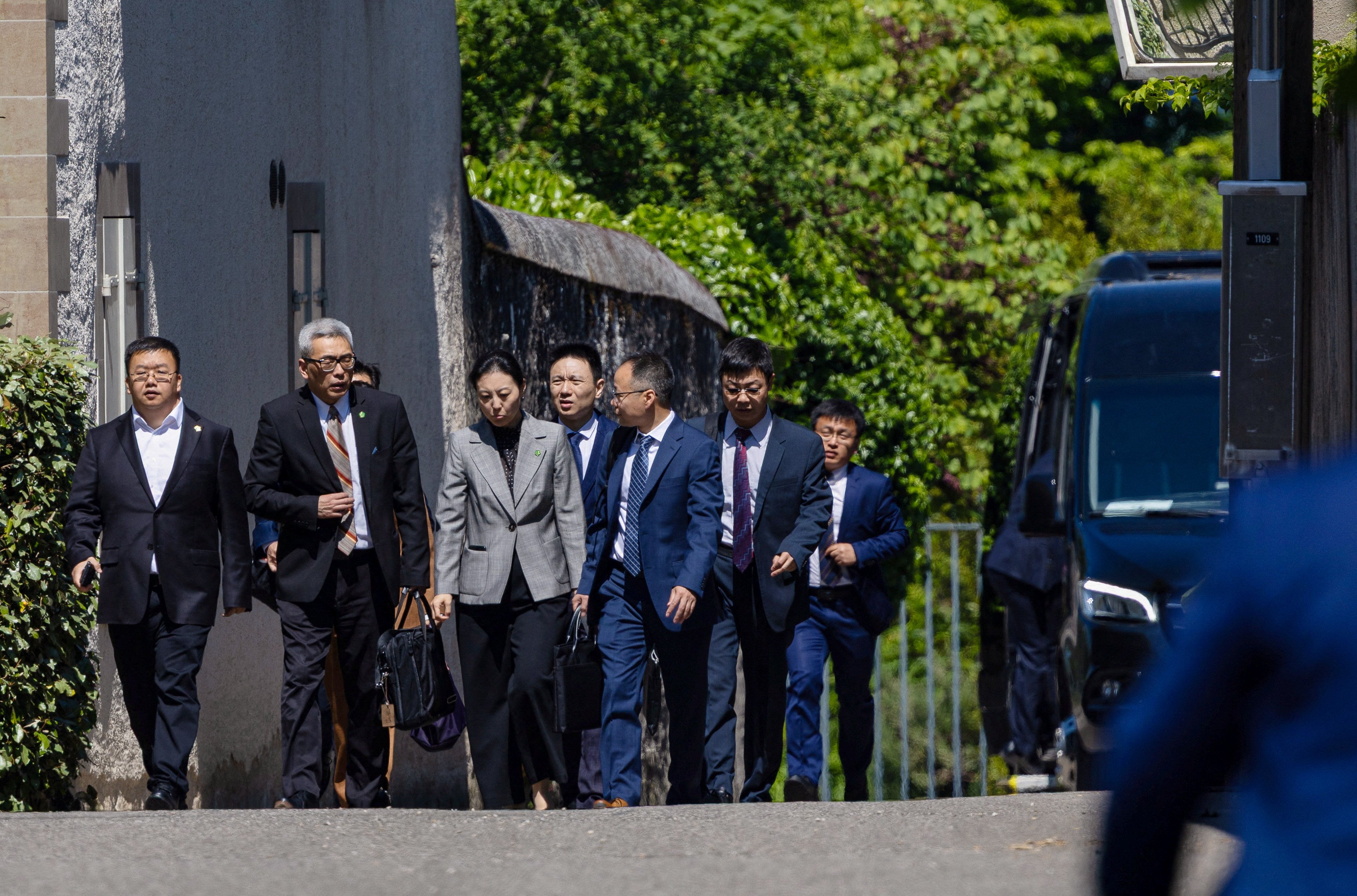 Members of the Chinese delegation leave a residence where trade talks between the US and China are taking place, in Geneva on Saturday. Photo: Reuters