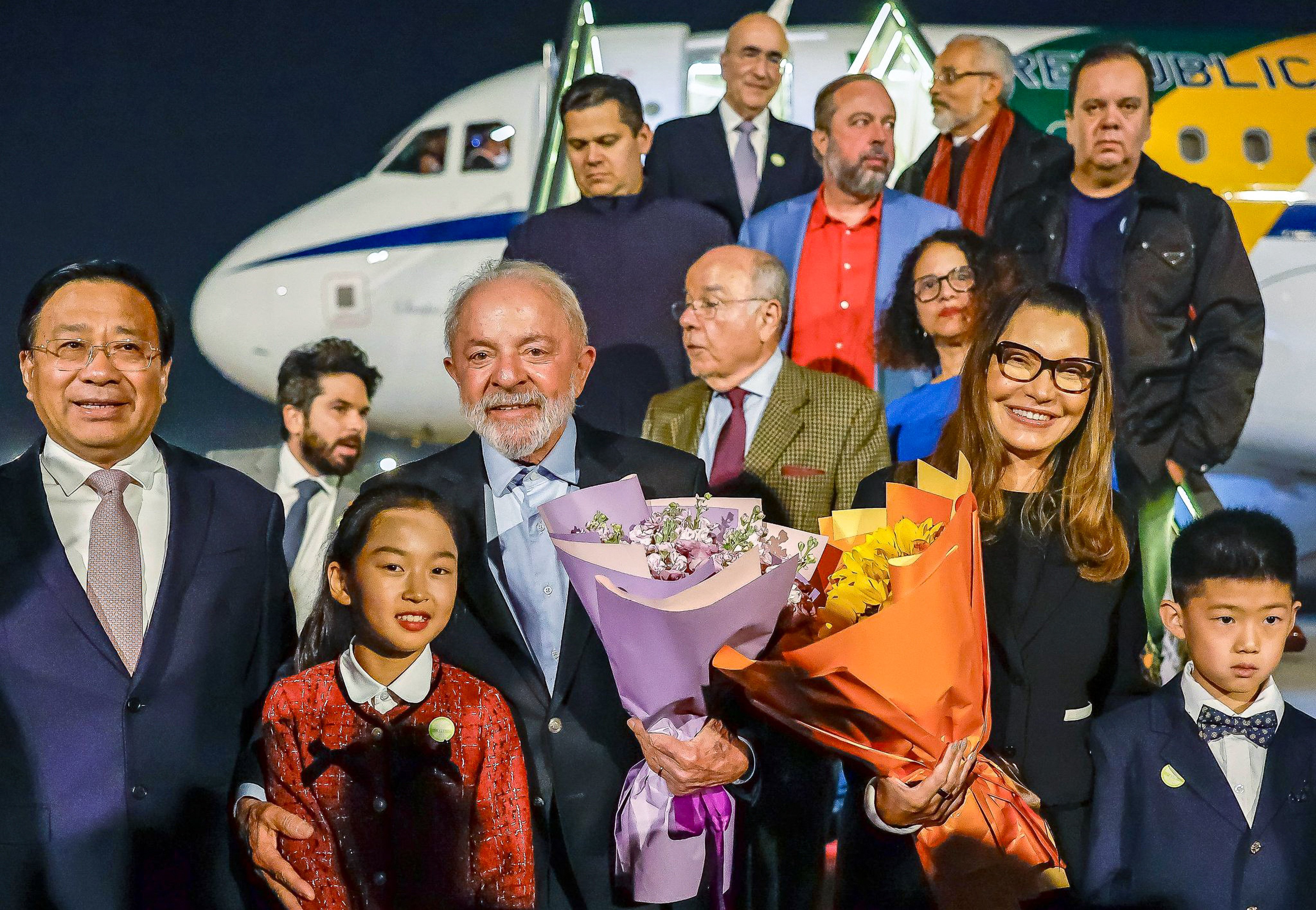 Brazilian President Luiz Inacio Lula da Silva (centre) arrives in China late on Saturday. Photo: Handout