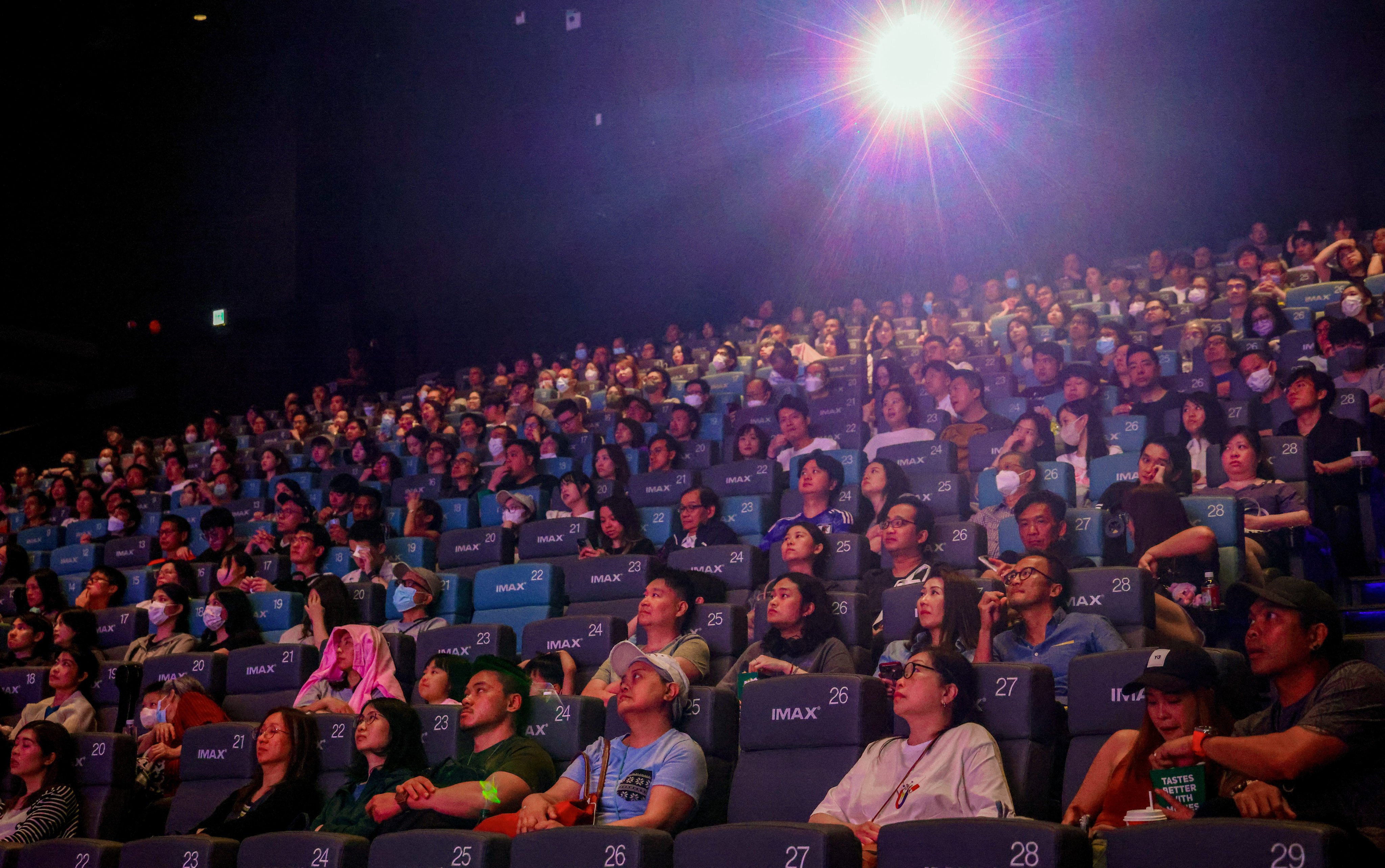 Cinema patrons gather on Saturday after securing discounts on tickets under the city’s annual promotion. Photo: Dickson Lee