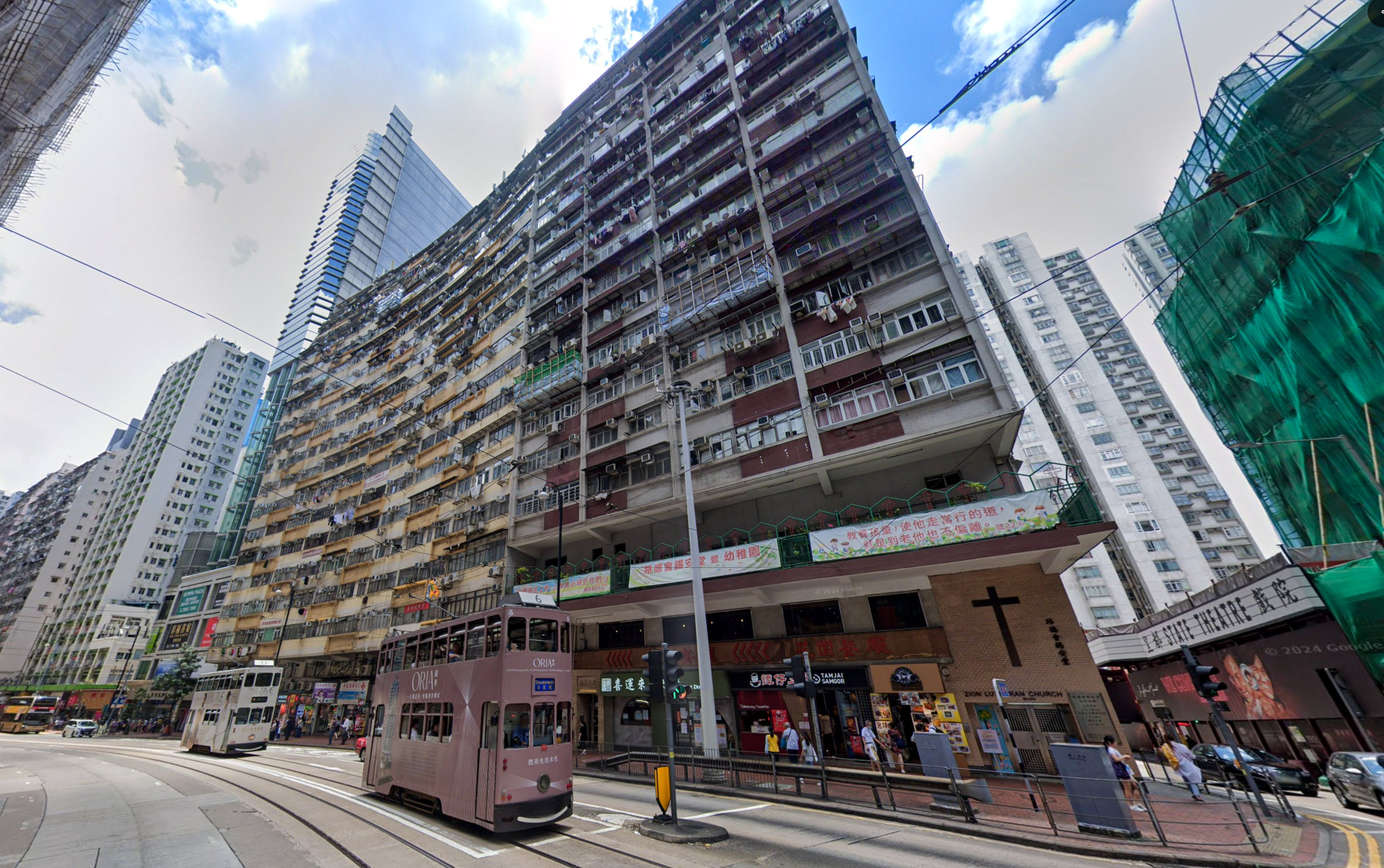 The window fell from the 62-year-old Nam Tin Building in North Point. Photo: Google Maps