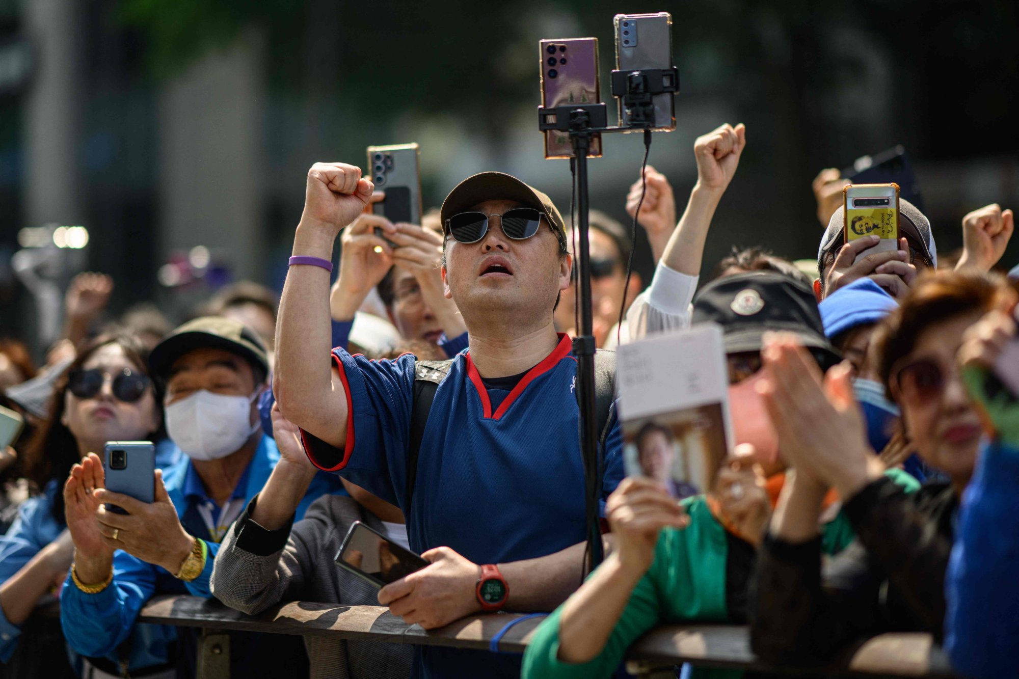 Supporters gesture during a campaign event for presidential candidate Lee Jae-myung in Seoul on Monday. Photo: AFP Supporters gesture during a campaign event for presidential candidate Lee Jae-myung in Seoul on Monday. Photo: AFP