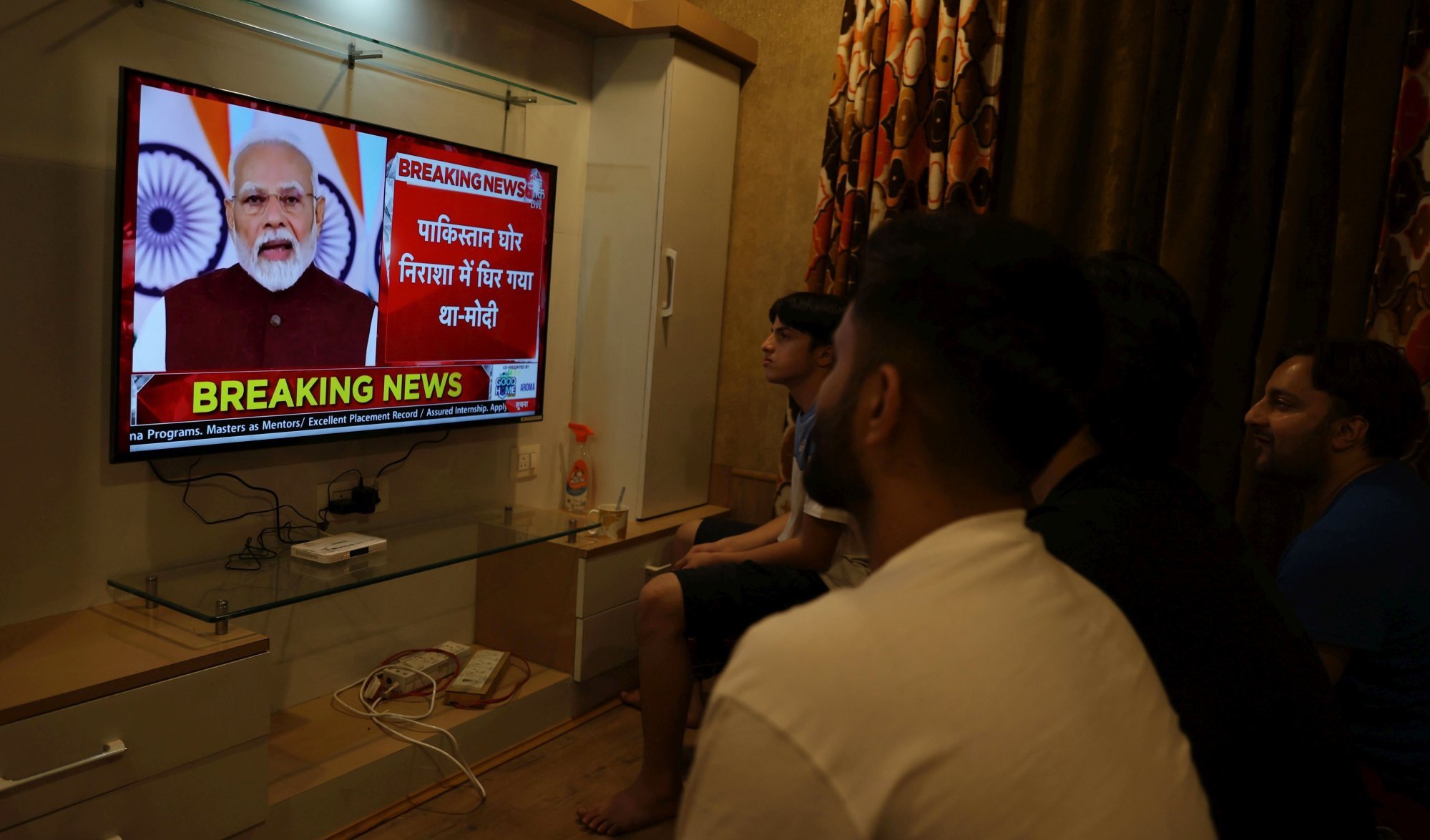 People watch Indian Prime Minister Narendra Modi addressing the nation for the first time since recent escalations in the India-Pakistan conflict, on a television screen in Srinagar, the summer capital of Indian Kashmir on Monday. Photo: EPA-EFE People watch Indian Prime Minister Narendra Modi addressing the nation for the first time since recent escalations in the India-Pakistan conflict, on a television screen in Srinagar, the summer capital of Indian Kashmir on Monday. Photo: EPA-EFE