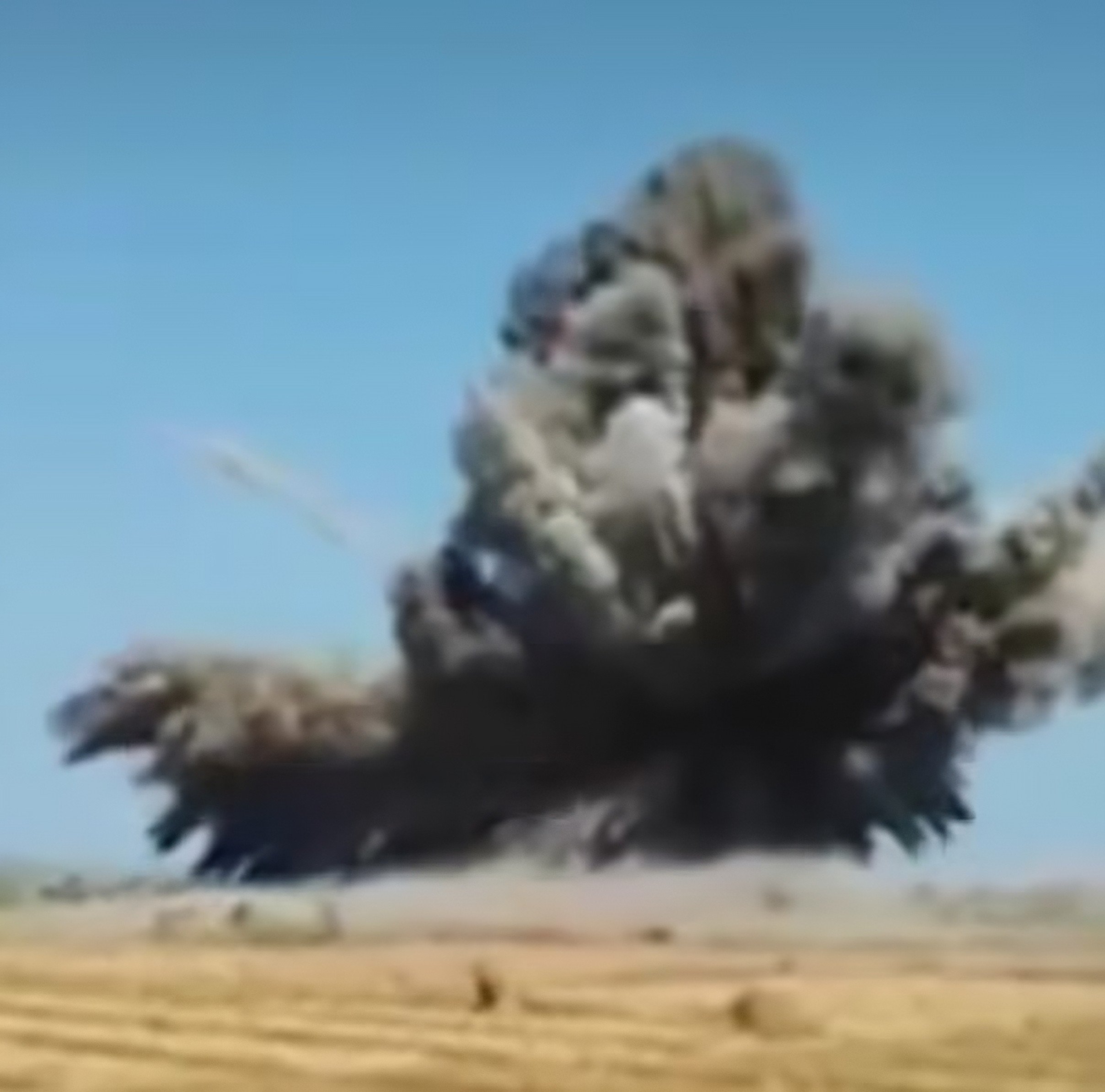A still from a social media video shows the explosion at an ammunition disposal site in Indonesia on Monday. Photo: Facebook/KangArdas