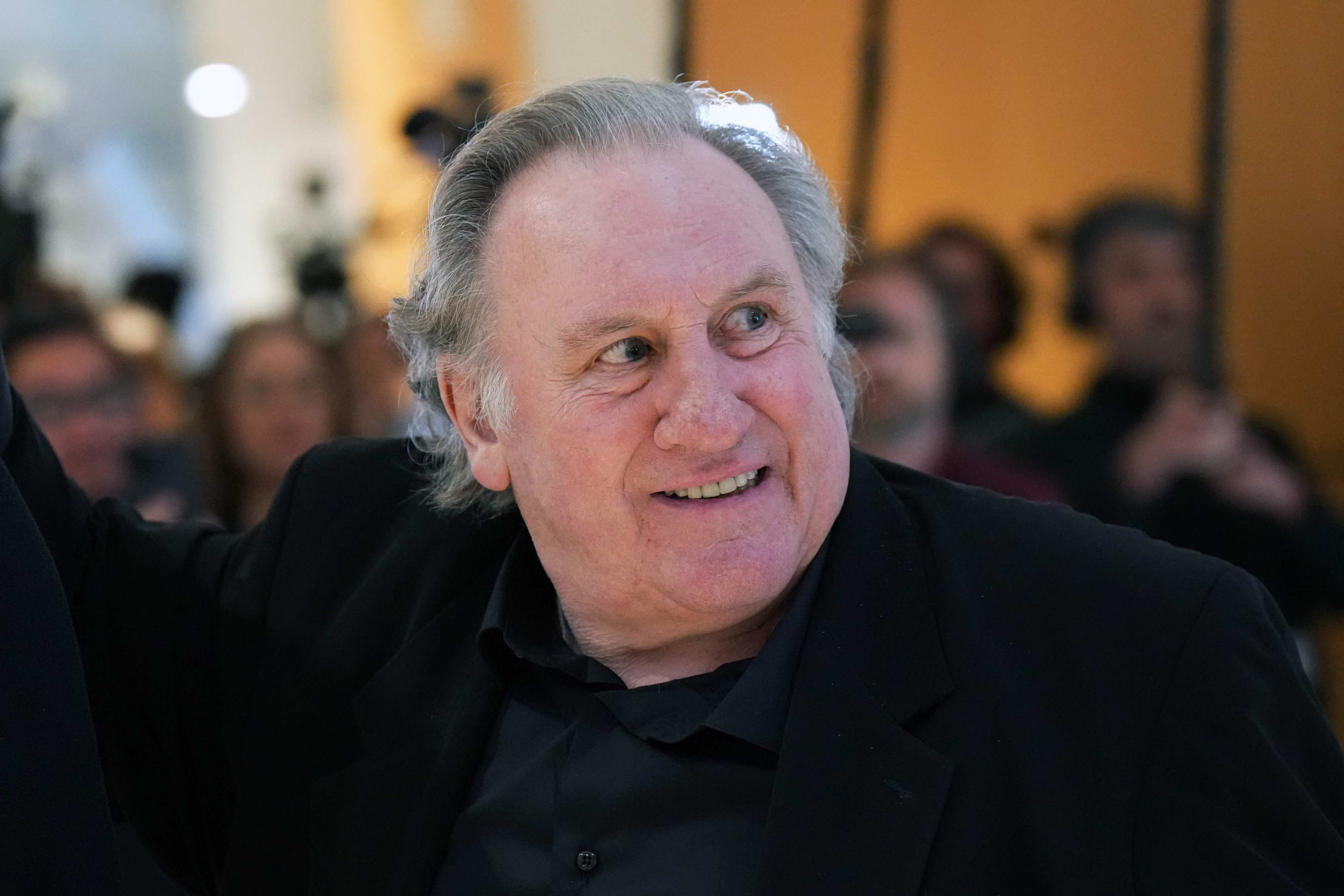 French actor Gerard Depardieu leaves the courtroom for a break during his trial in which he is charged with sexually assaulting two women during a film shoot in 2021. Photo: AFP