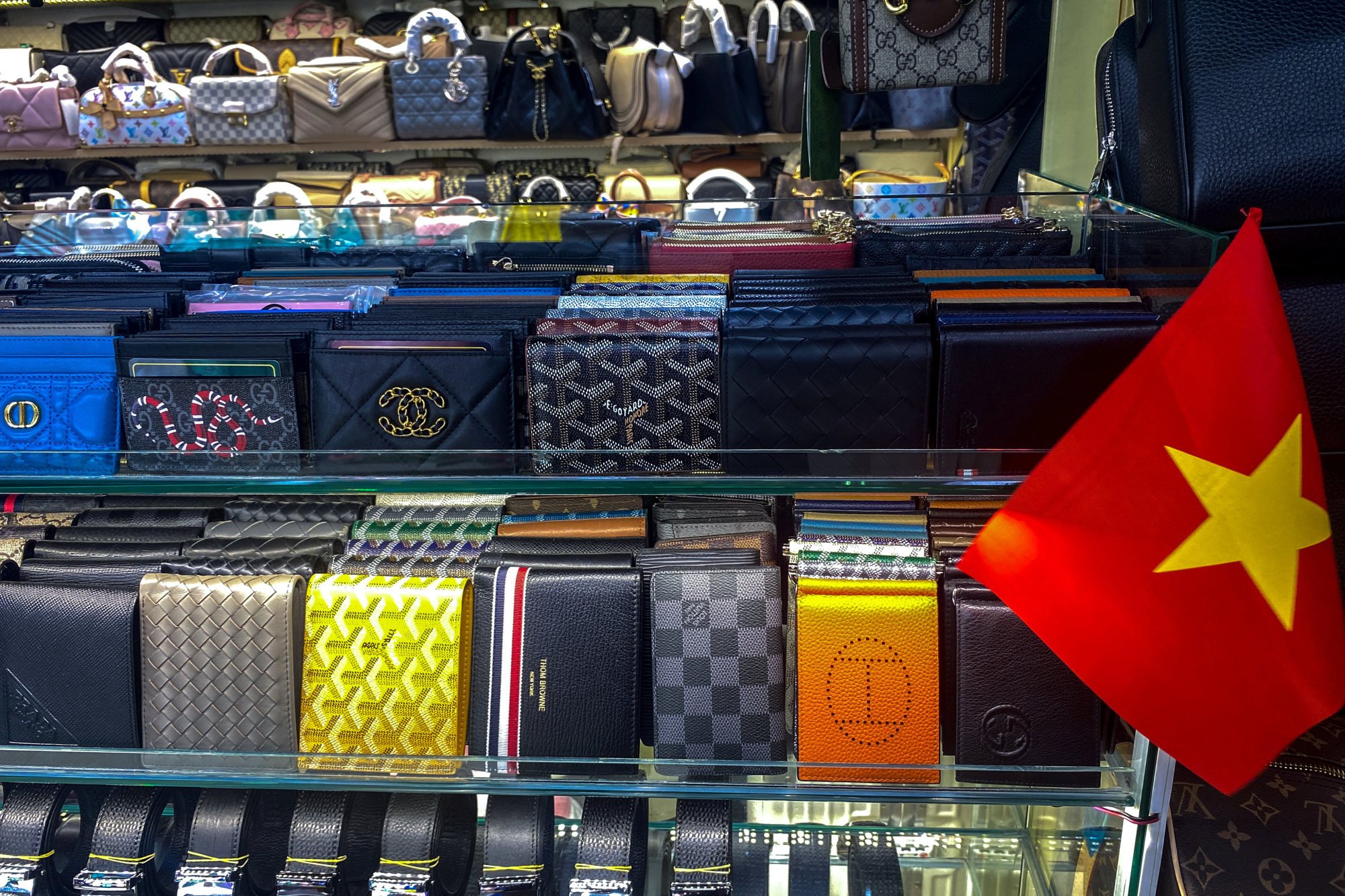 Counterfeit products are seen displayed at a shop in Ho Chi Minh City. Photo: Reuters Counterfeit products are seen displayed at a shop in Ho Chi Minh City. Photo: Reuters