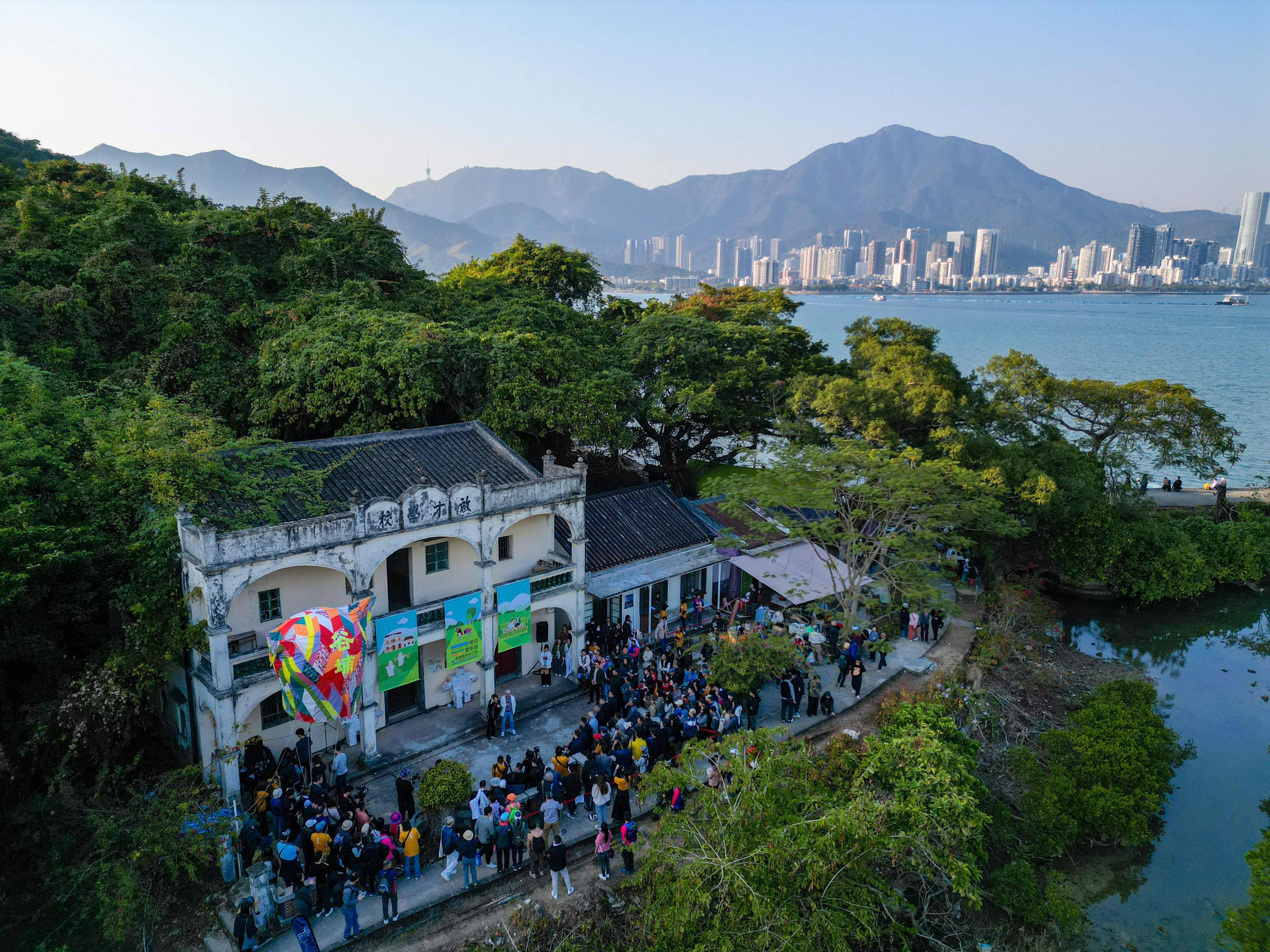 Visitors gather at Kai Choi School during the launch ceremony of the Countryside Harvest Festival in Kuk Po. Photo: Eugene Lee