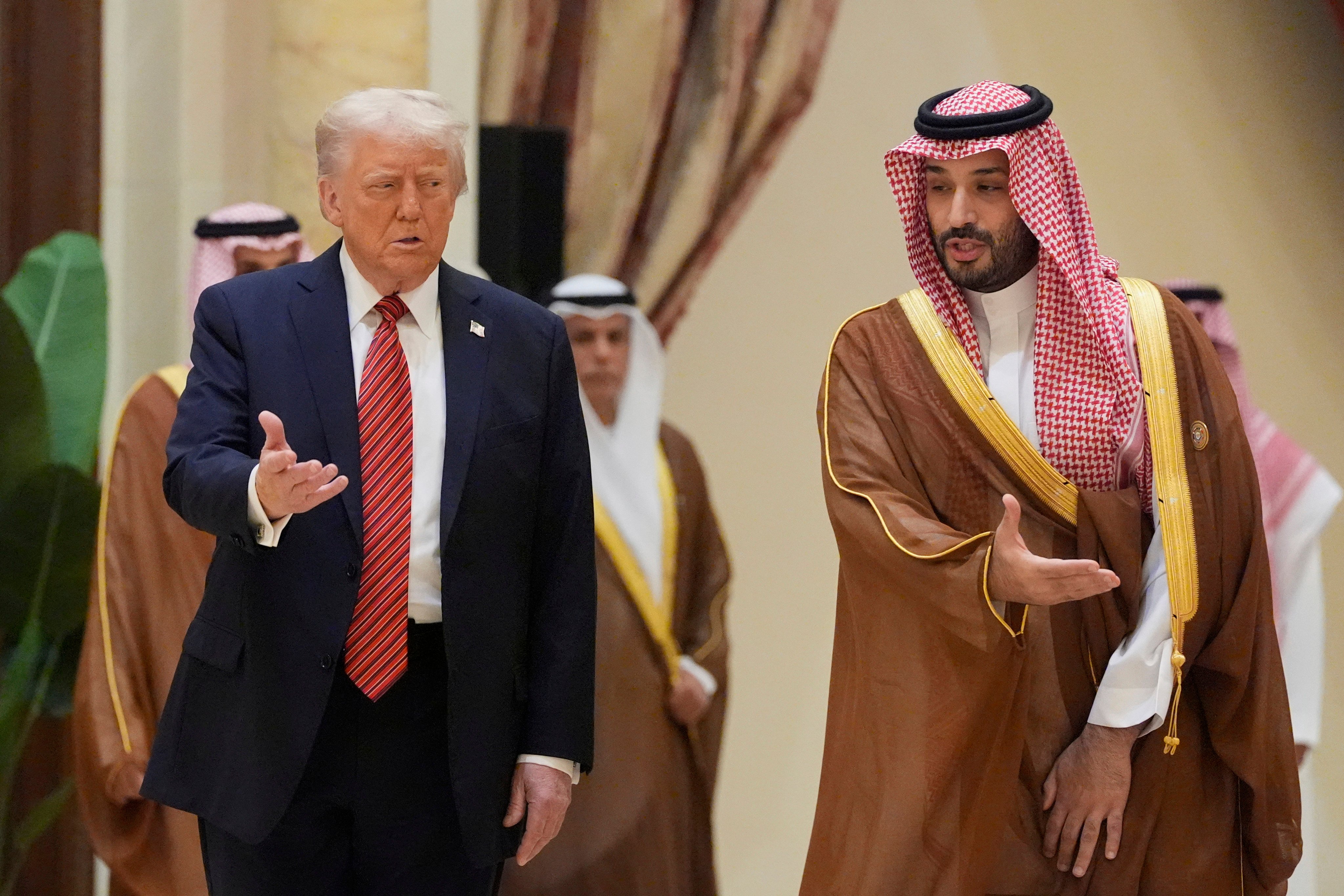 US President Donald Trump arrives with Saudi Arabia’s Crown Prince Mohammed bin Salman at the Gulf Cooperation Council Summit in Riyadh on May 14, 2025. Photo: AP