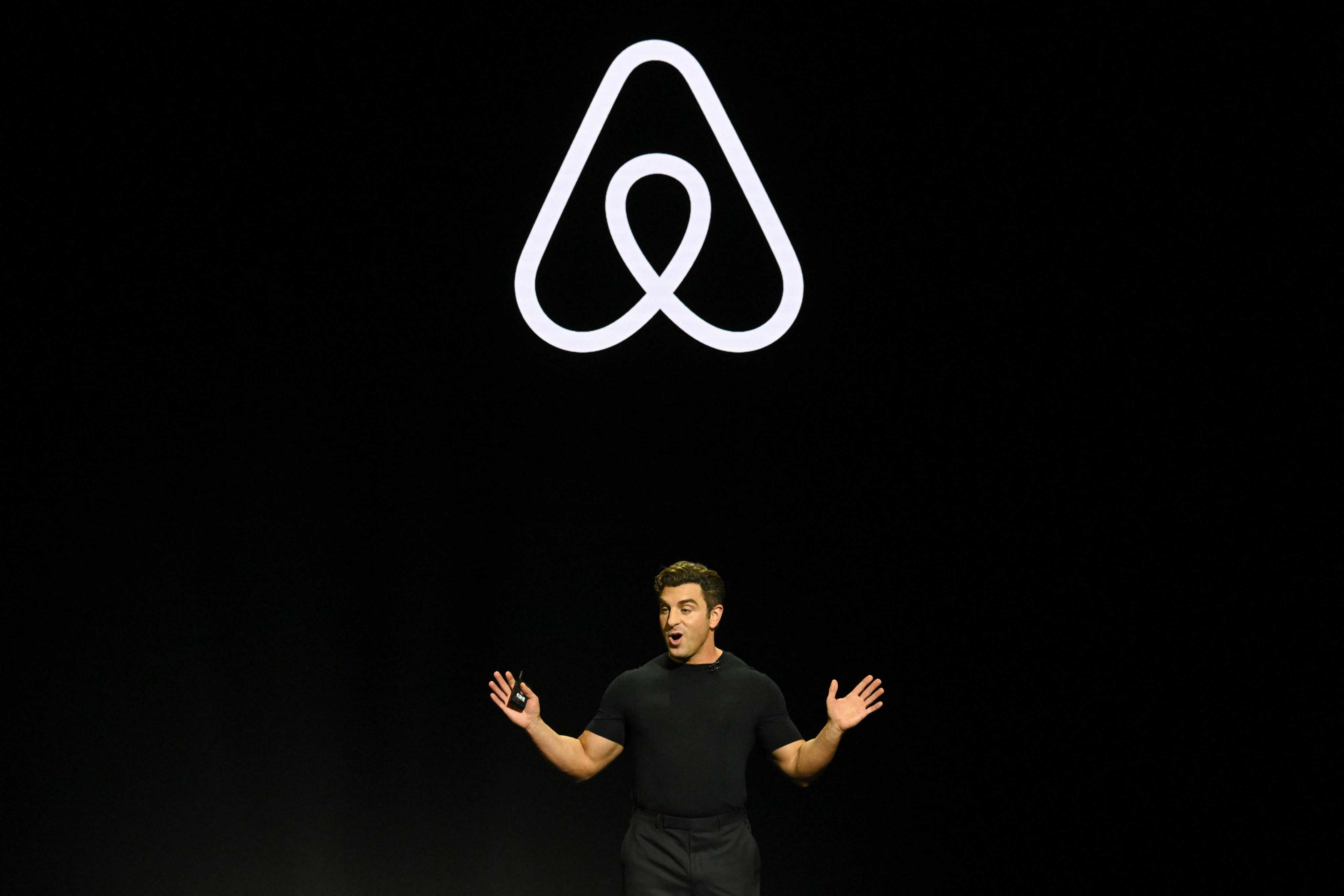 Airbnb co-founder and CEO Brian Chesky describes the addition of services to the platform as “giving you the best of both worlds”. Photo: AFP