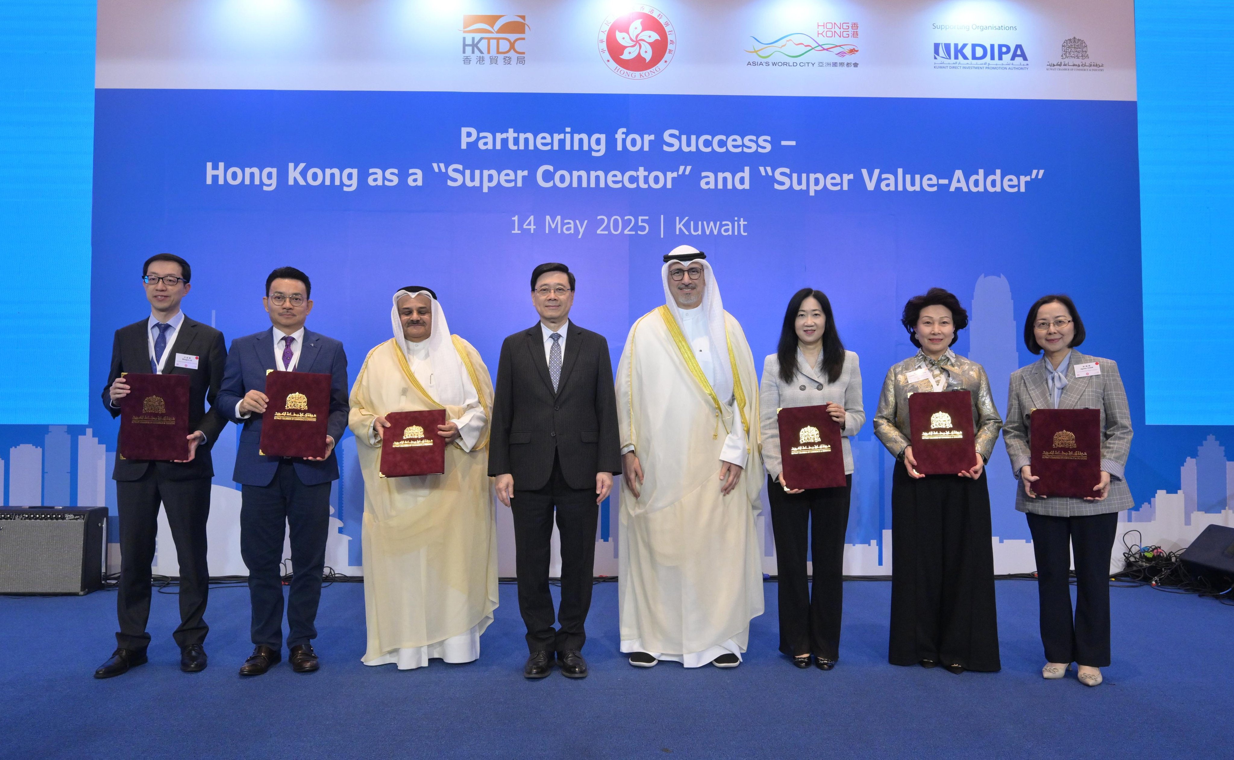 Chief Executive John Lee (fourth from left) at  a business luncheon in Kuwait. Photo: Handout