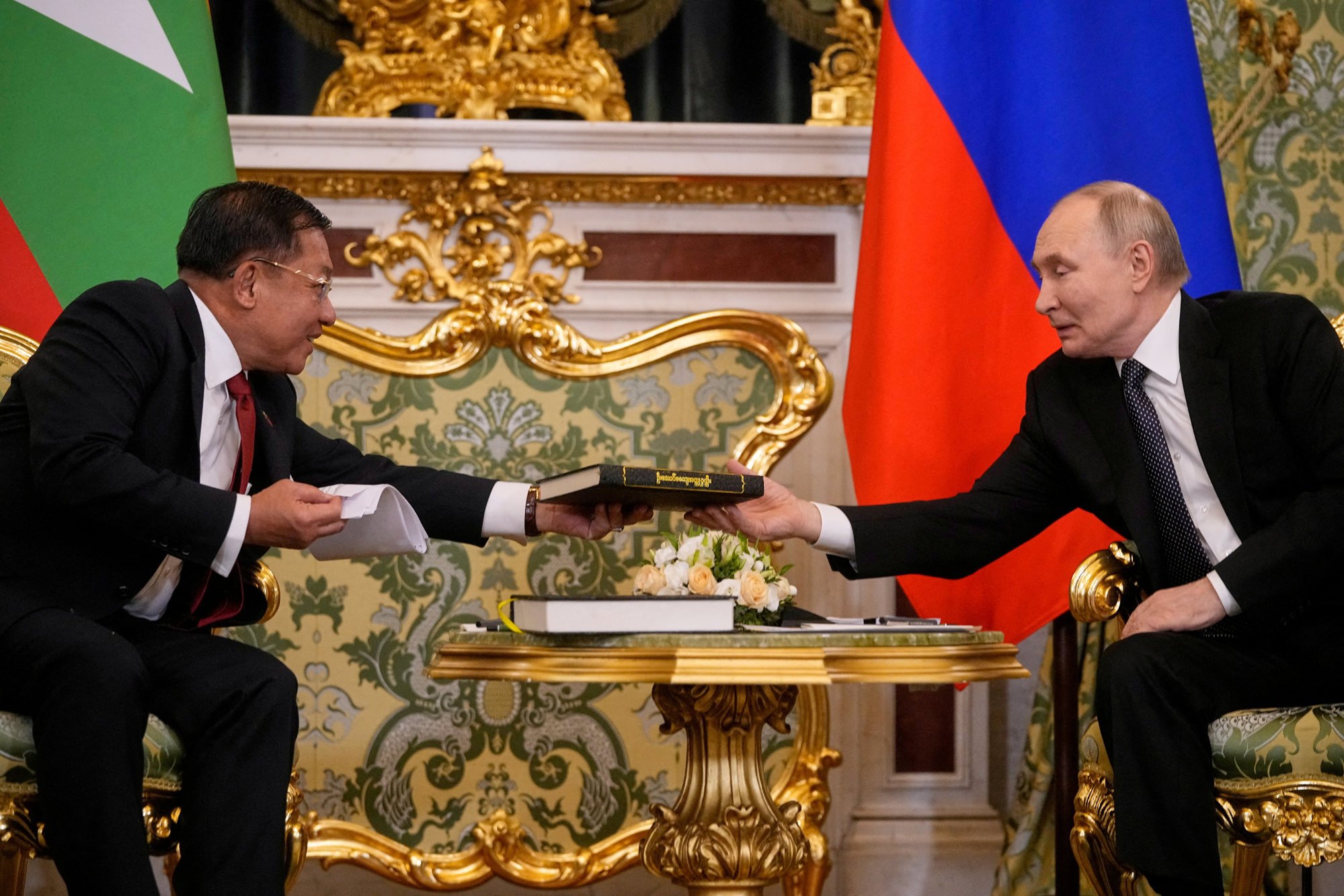 Myanmar’s military chief Senior General Min Aung Hlaing presents a book to Russia’s President Vladimir Putin during a meeting in Moscow on March 4. Photo: Reuters Myanmar’s military chief Senior General Min Aung Hlaing presents a book to Russia’s President Vladimir Putin during a meeting in Moscow on March 4. Photo: Reuters