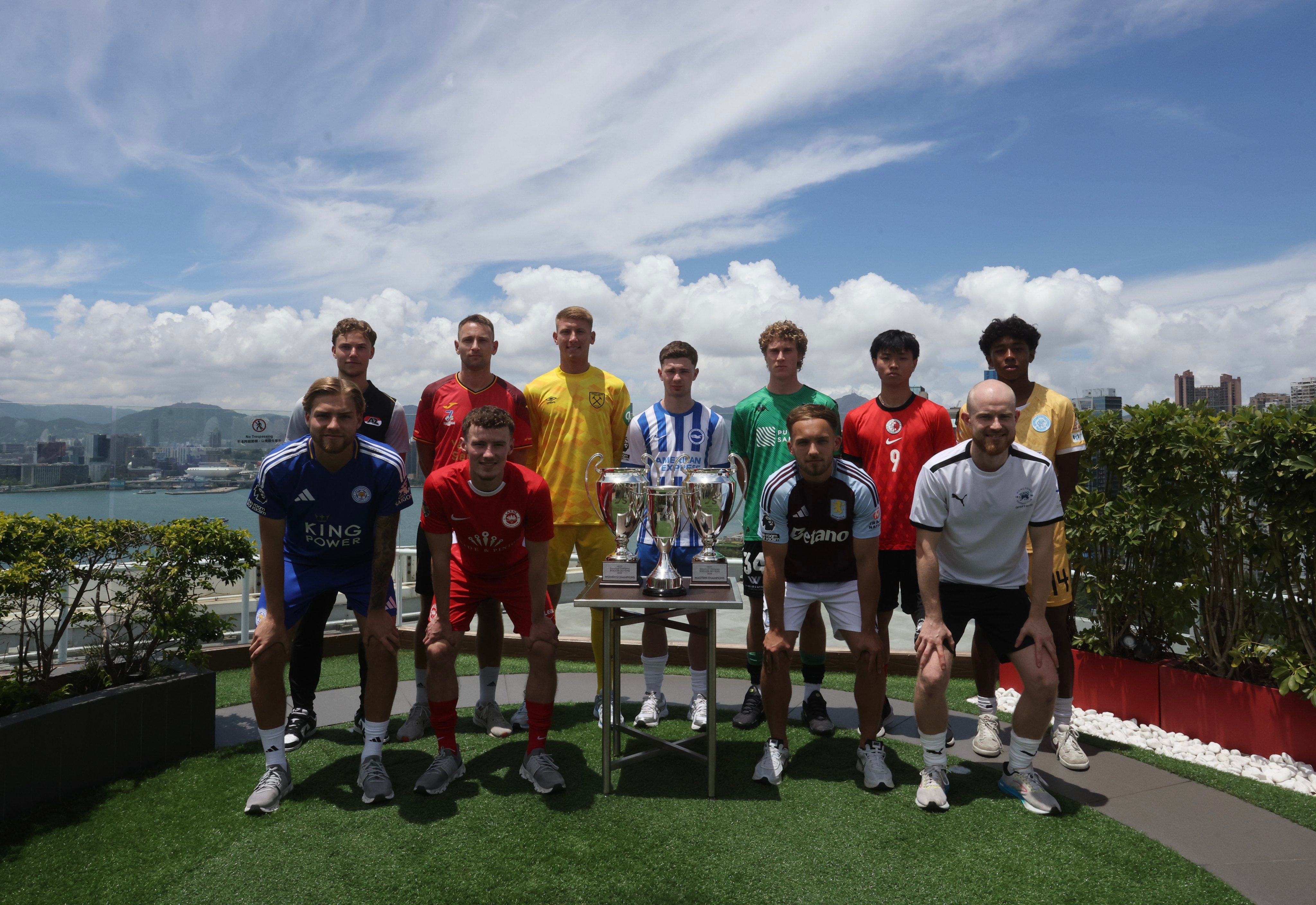 The captains of the men’s teams taking part in the HKFC Soccer Sevens pose next to the trophy ahead of the start of the tournament. Photo: Jonathan Wong