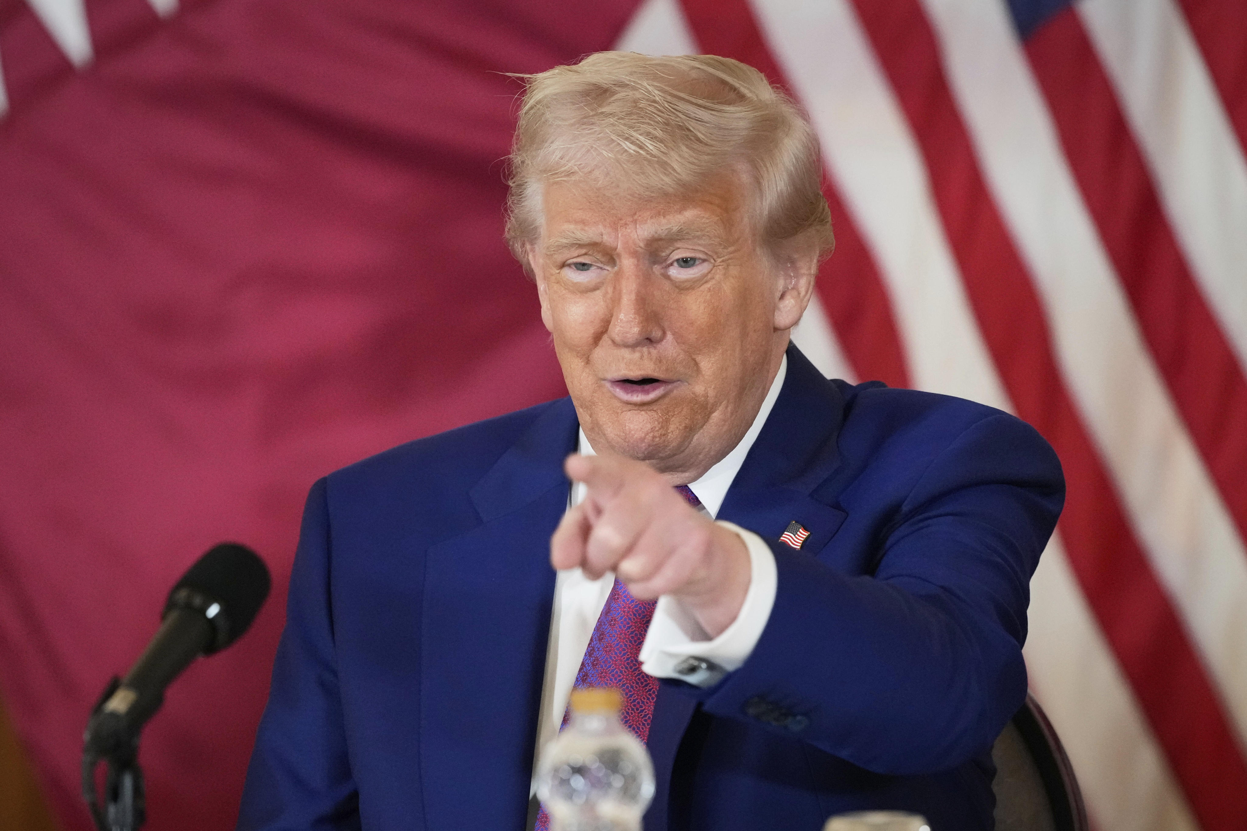 US President Donald Trump gestures during a business roundtable in Doha, Qatar, on Thursday. Photo: AP