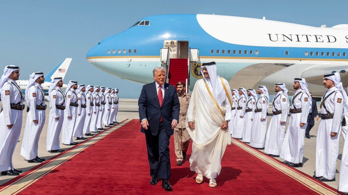 Qatar’s Emir Sheikh Tamim bin Hamad al-Thani welcomes US President Donald Trump upon his arrival in Doha on Wednesday. Photo: Qatar News Agency via EPA-EFE