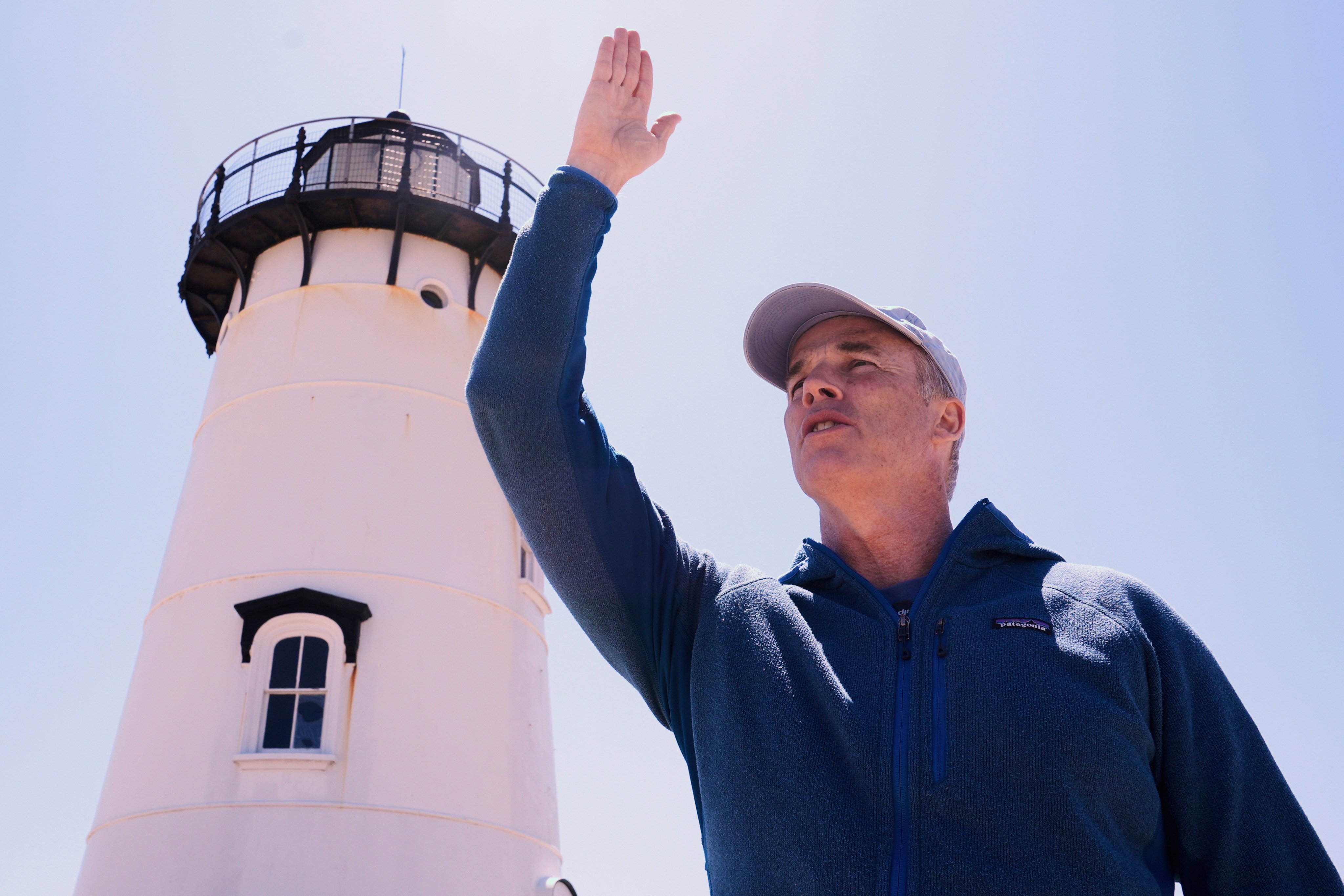 Endurance swimmer Lewis Pugh near the Edgartown Lighthouse where he will begin his swim around Martha’s Vineyard, the island in the US state of Massachusetts where scenes for the film Jaws were shot 50 years ago. On land Pugh, 55, will advocate for sharks. Photo: AP