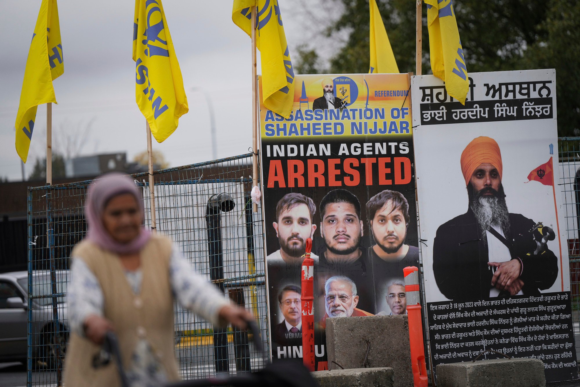 A photograph of late temple president Hardeep Singh Nijjar (back right) is displayed outside the Guru Nanak Sikh Gurdwara Sahib, in Surrey, British Columbia, in October 2024. Photo: The Canadian Press via AP A photograph of late temple president Hardeep Singh Nijjar (back right) is displayed outside the Guru Nanak Sikh Gurdwara Sahib, in Surrey, British Columbia, in October 2024. Photo: The Canadian Press via AP