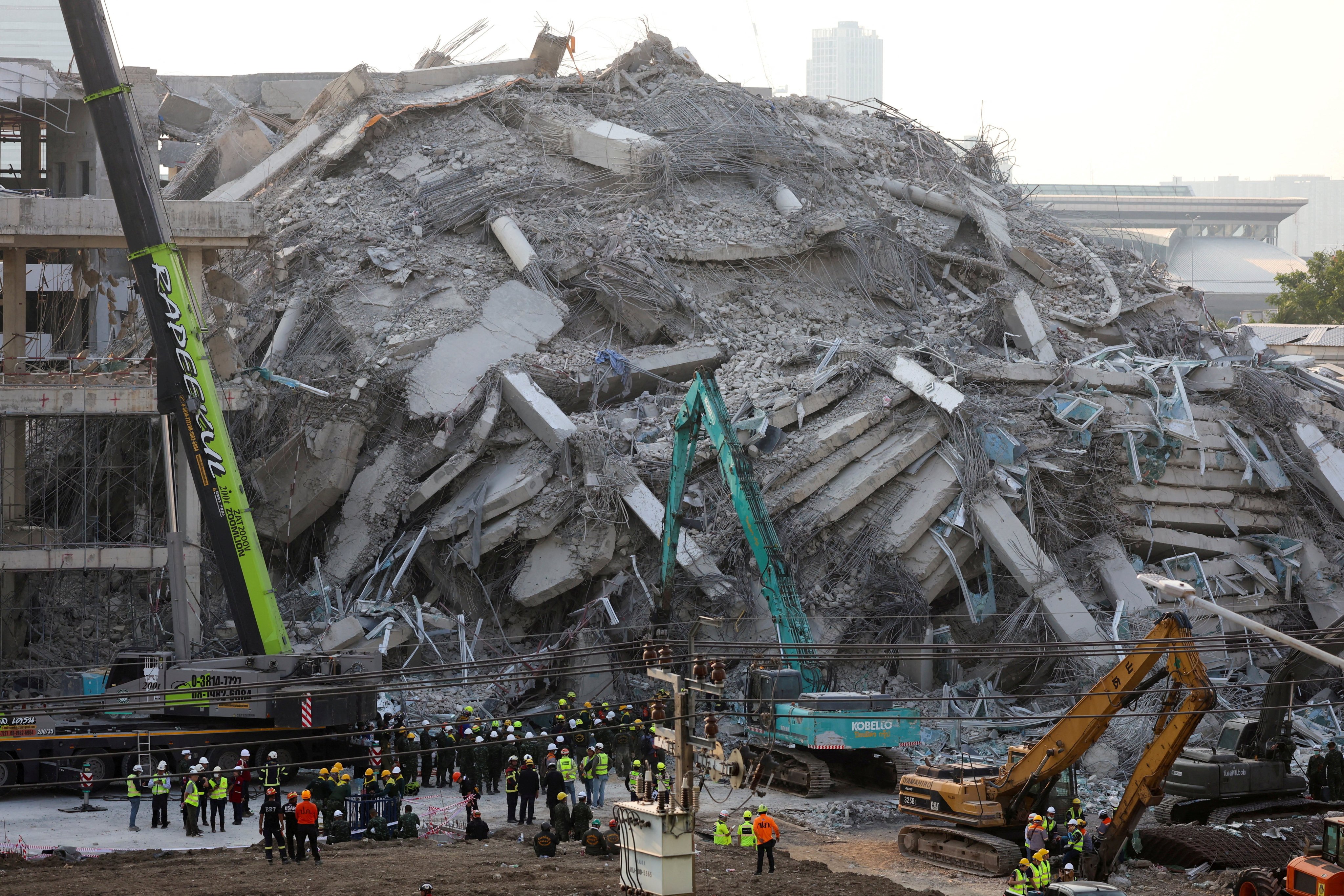 Rescuers work at the site of the collapsed building in Bangkok on March 29. Photo: Reuters