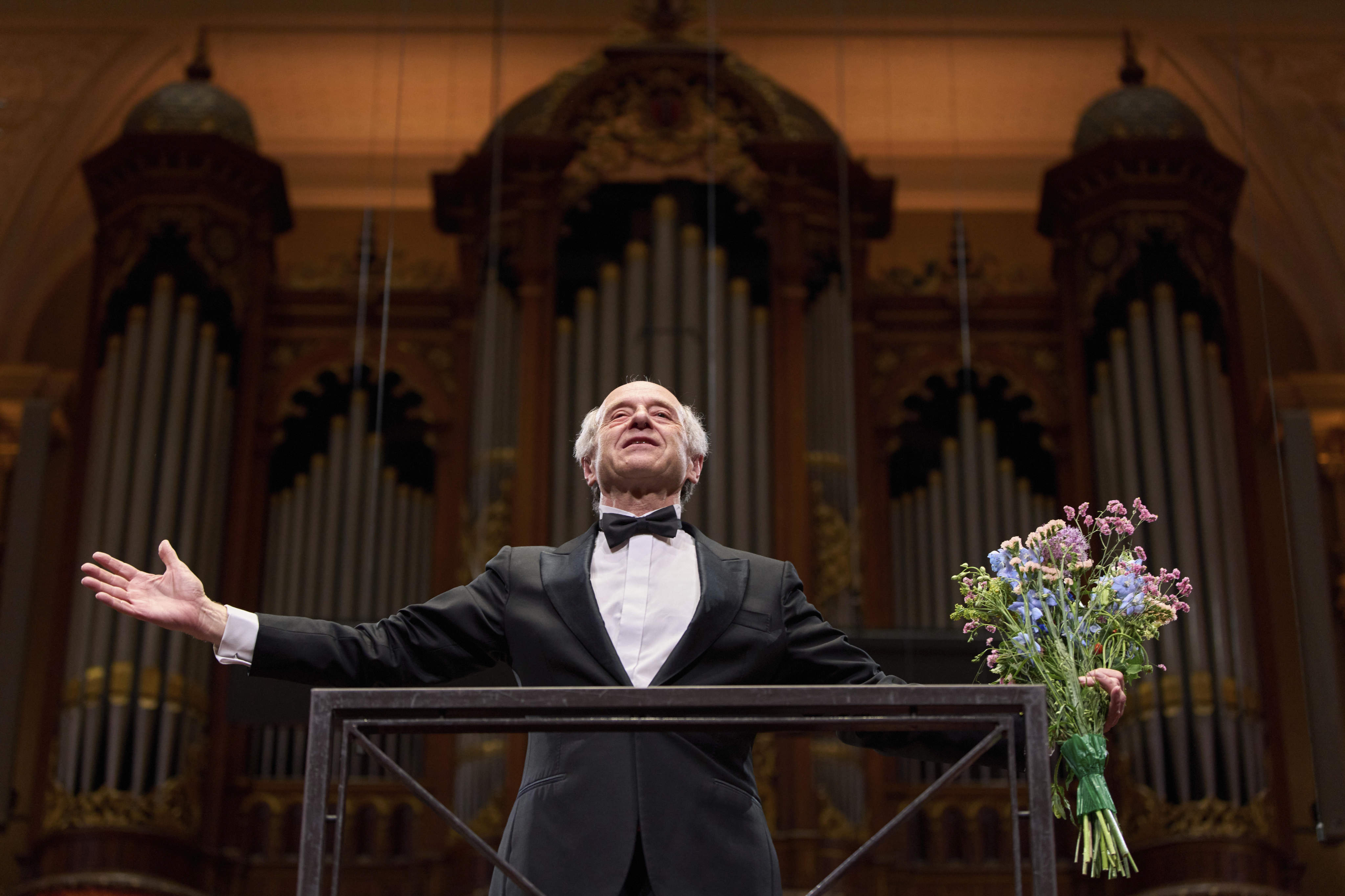 Ivan Fischer acknowledges the audience’s applause after conducting the Budapest Festival Orchestra and the Netherlands Radio Choir in Mahler’s Symphony No 2 in the Concertgebouw in Amsterdam, Netherlands, part of its Gustav Mahler Festival. Photo: AP