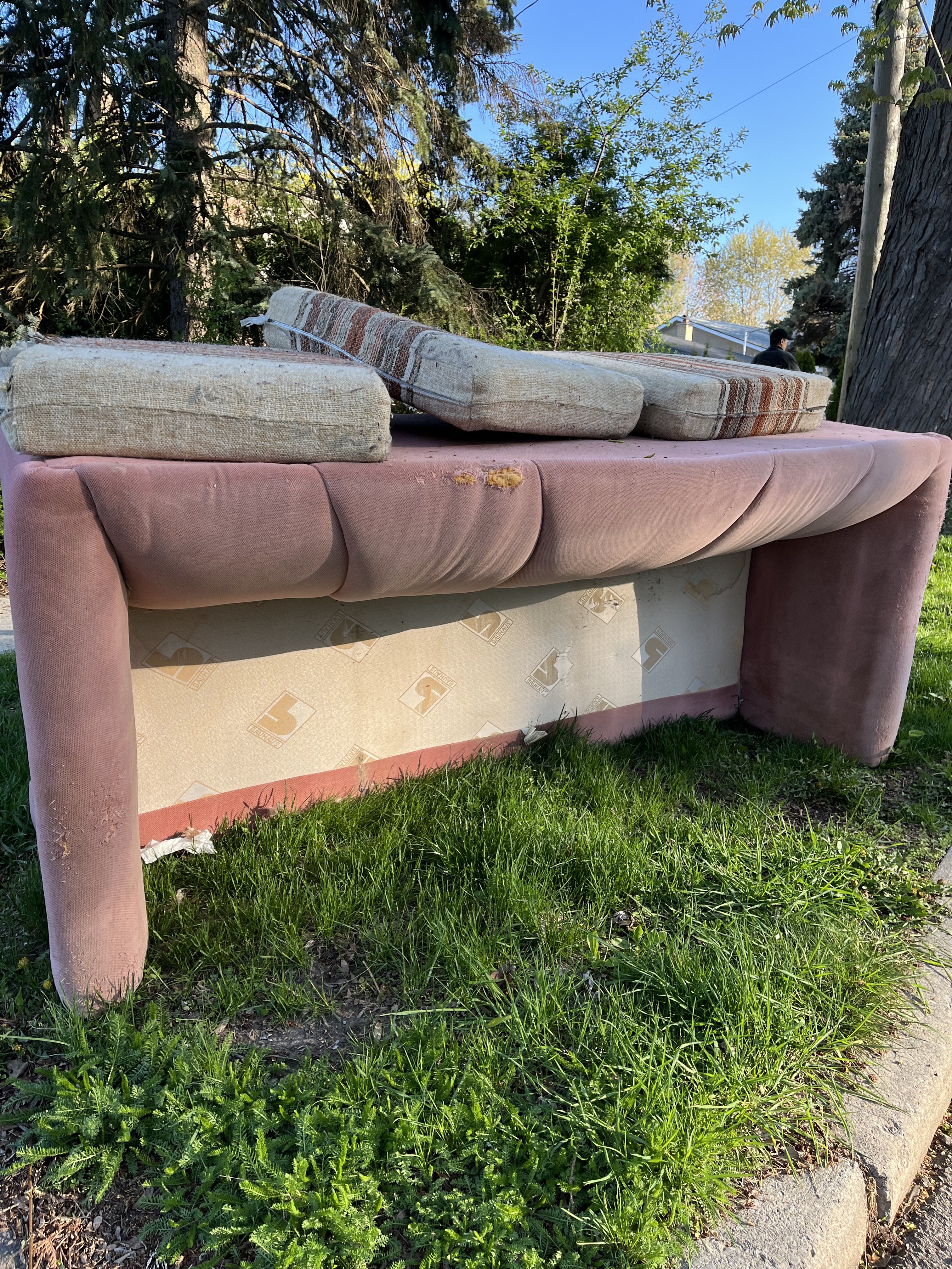 Alex Lo’s old sofa, which he refers to as “my pink lady”, pictured out on the curb, waiting to be collected by the rubbish collectors. Photo: Alex Lo