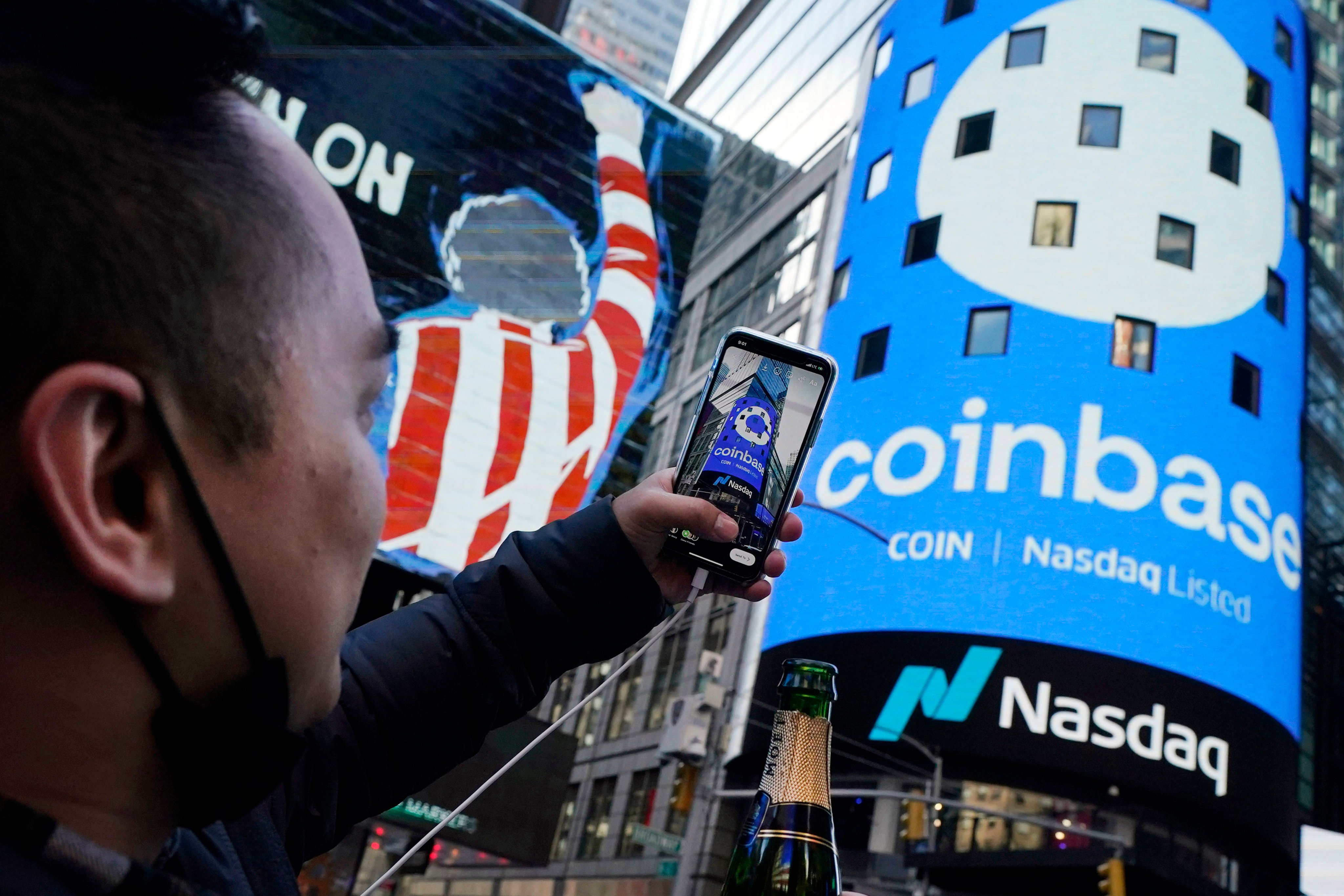 The Coinbase logo seen in New York’s Times Square. Photo: AP Photo