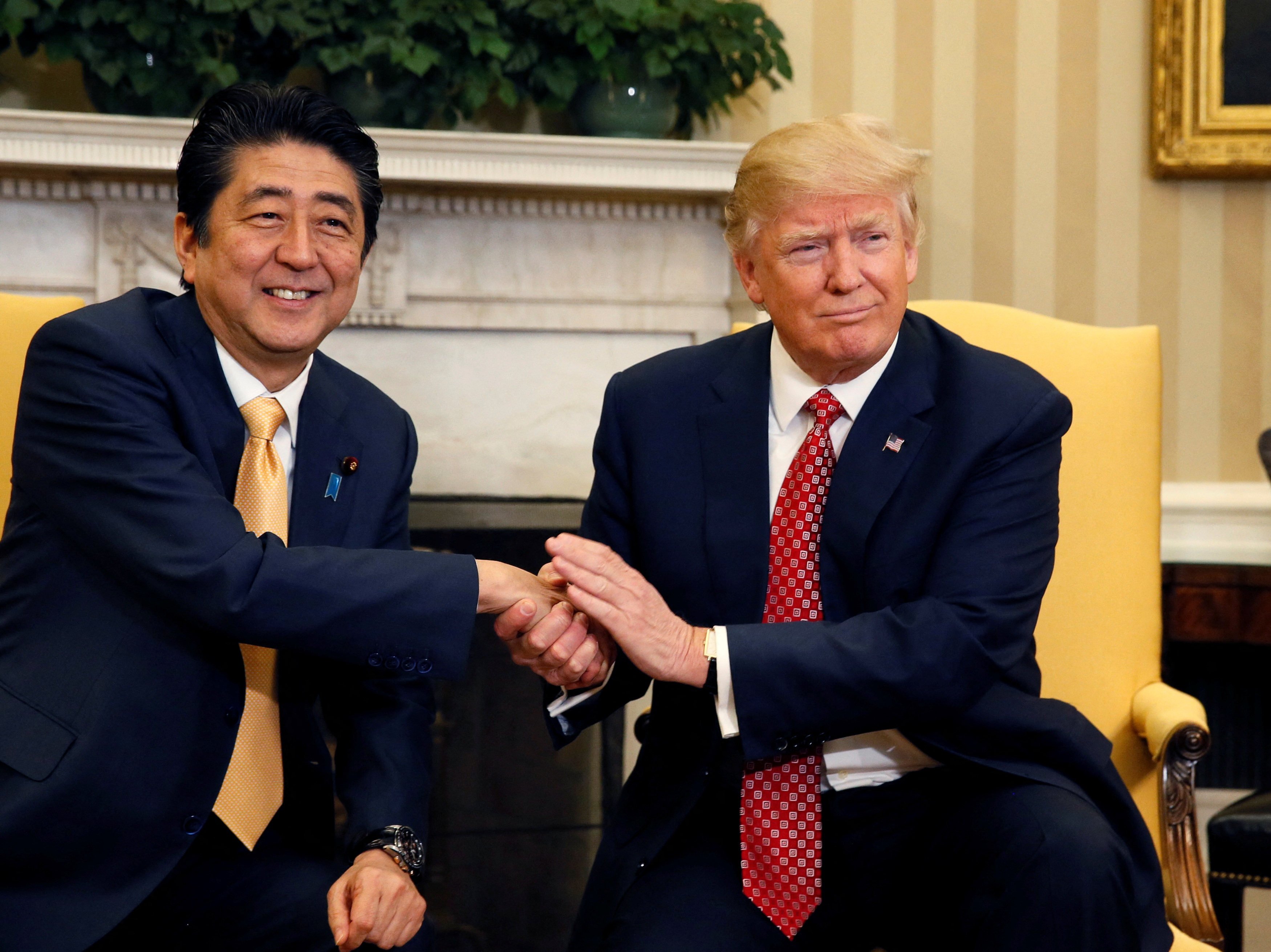 Japan’s former prime minister, the late Shinzo Abe, shakes hands with US President Donald Trump at the White House in 2017. Abe helped give political voice to the Indo-Pacific concept. Photo: Reuters