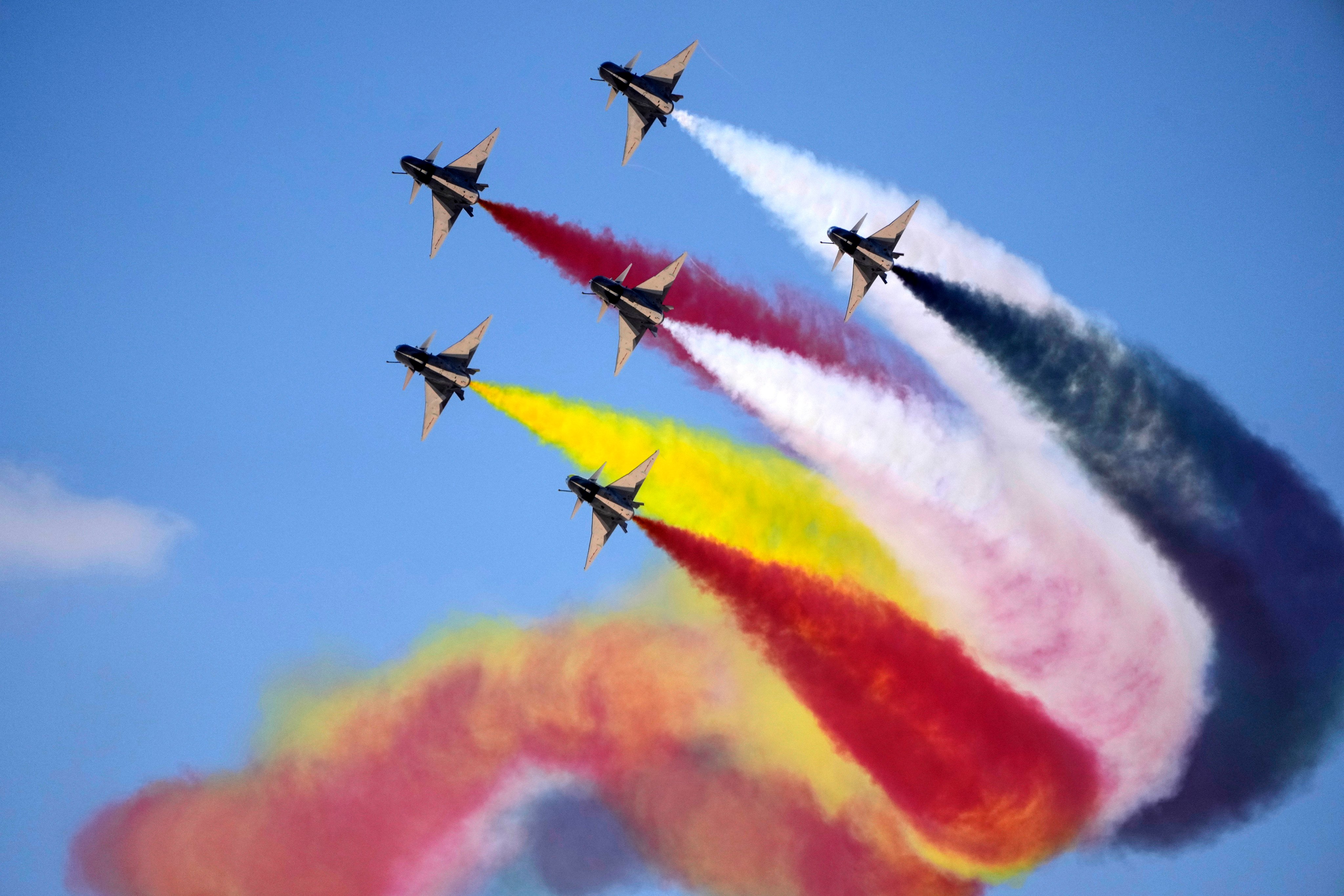 Chinese J-10 fighter jets perform during the first edition of the Egypt International Airshow at al-Alamein airport on September 4. Photo: AP