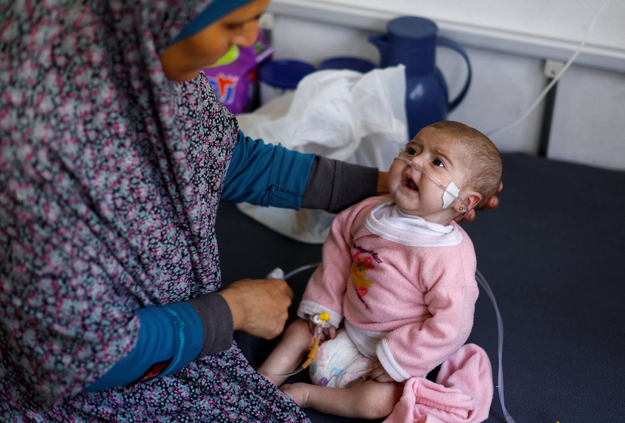 A Palestinian child suffering from malnutrition receives treatment in the southern Gaza Strip in April last year. Photo: Reuters A Palestinian child suffering from malnutrition receives treatment in the southern Gaza Strip in April last year. Photo: Reuters