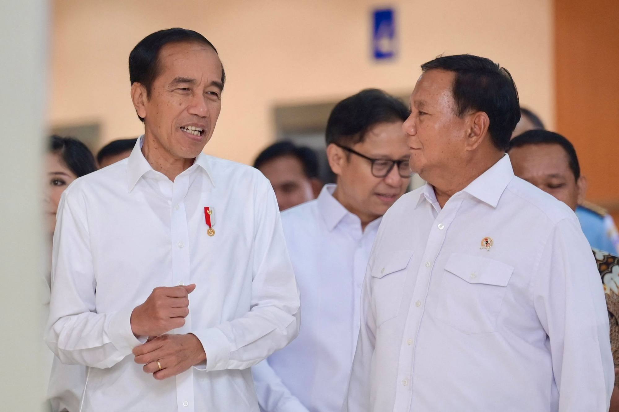 A college student in West Java was arrested after posting an AI generated meme current President Prabowo Subianto (right) kissing his predecessor Joko Widodo. Photo: AFP A college student in West Java was arrested after posting an AI generated meme current President Prabowo Subianto (right) kissing his predecessor Joko Widodo. Photo: AFP