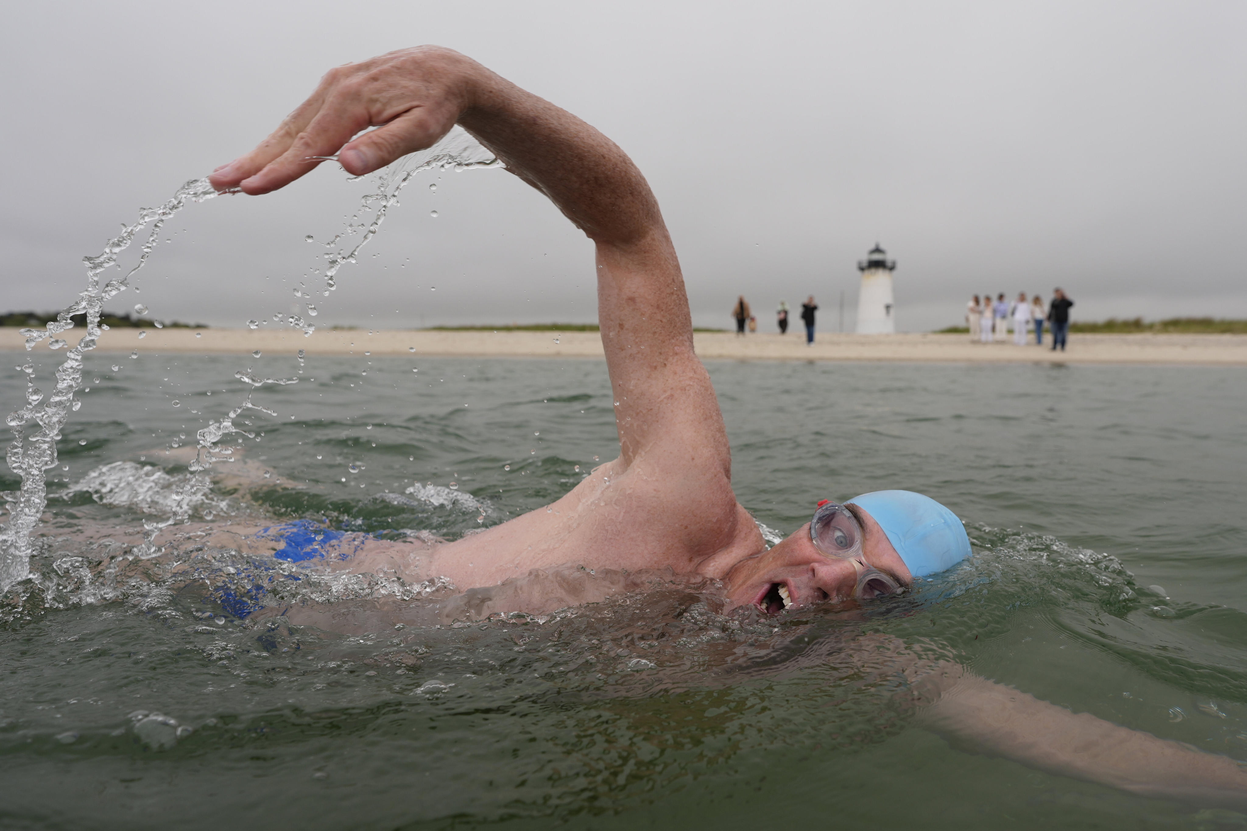 Endurance swimmer Lewis Pugh near the Edgartown Lighthouse at the start of his attempt to swim around Martha’s Vineyard, the island in the US state of Massachusetts where scenes for the film Jaws were shot 50 years ago. On land Pugh, 55, will advocate for sharks. Photo: AP